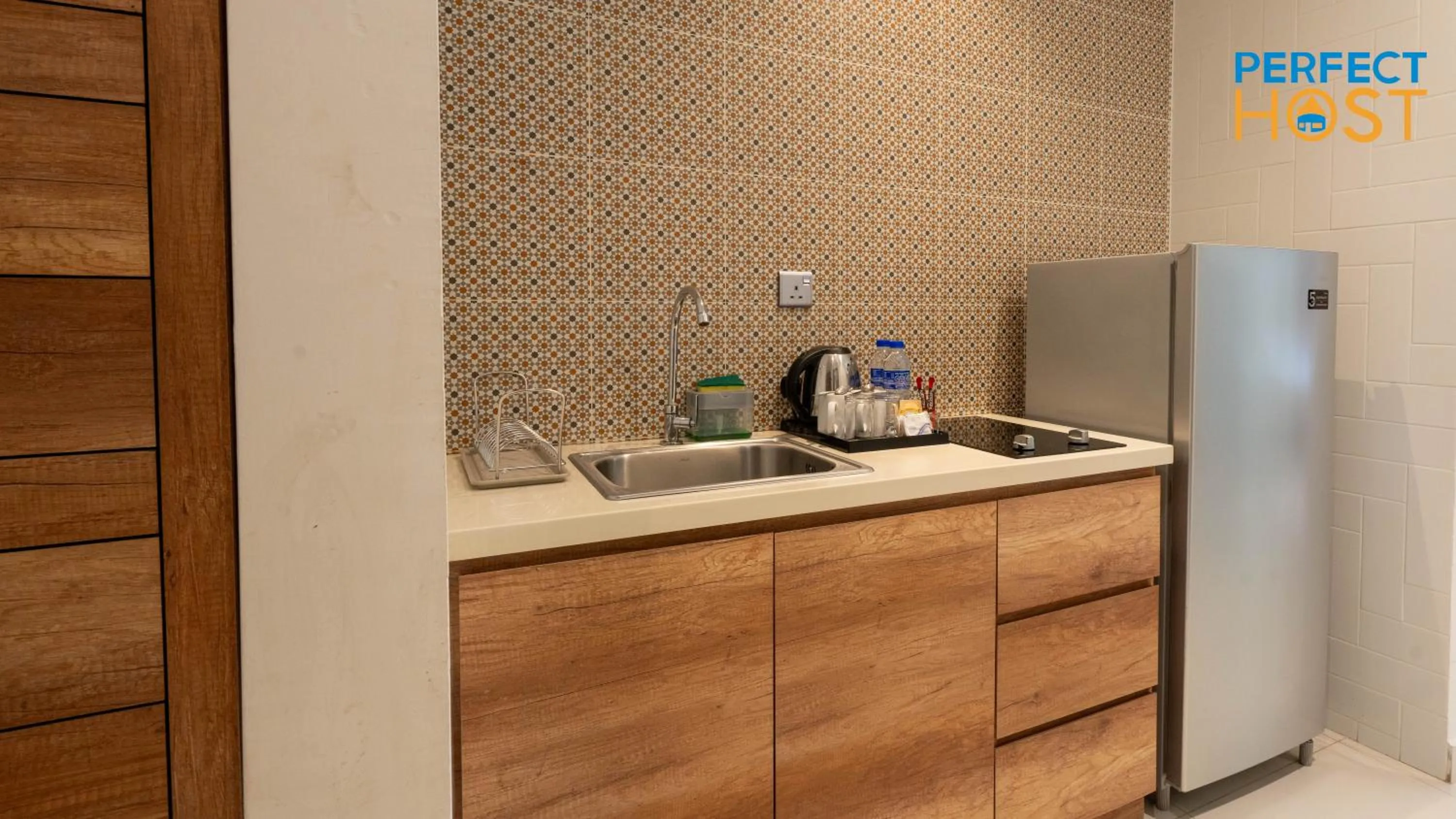 Kitchen or kitchenette in Damai Laut Escape by Perfect Host