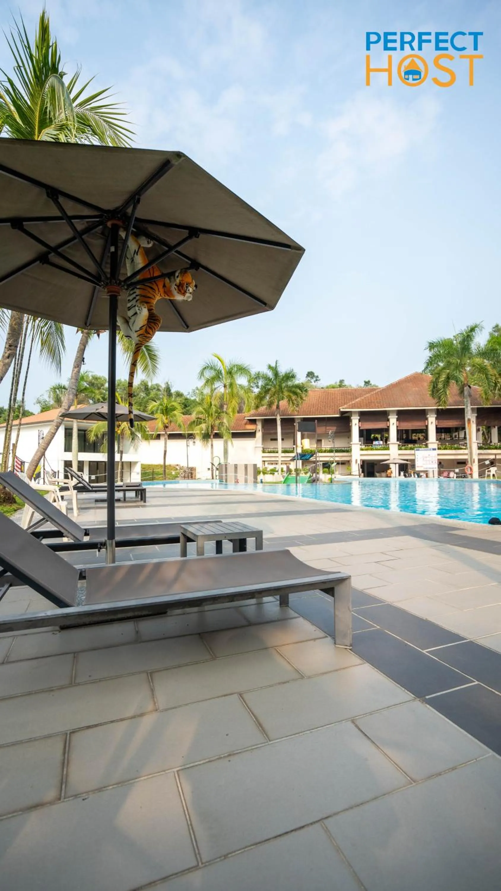 Swimming pool in Damai Laut Escape by Perfect Host