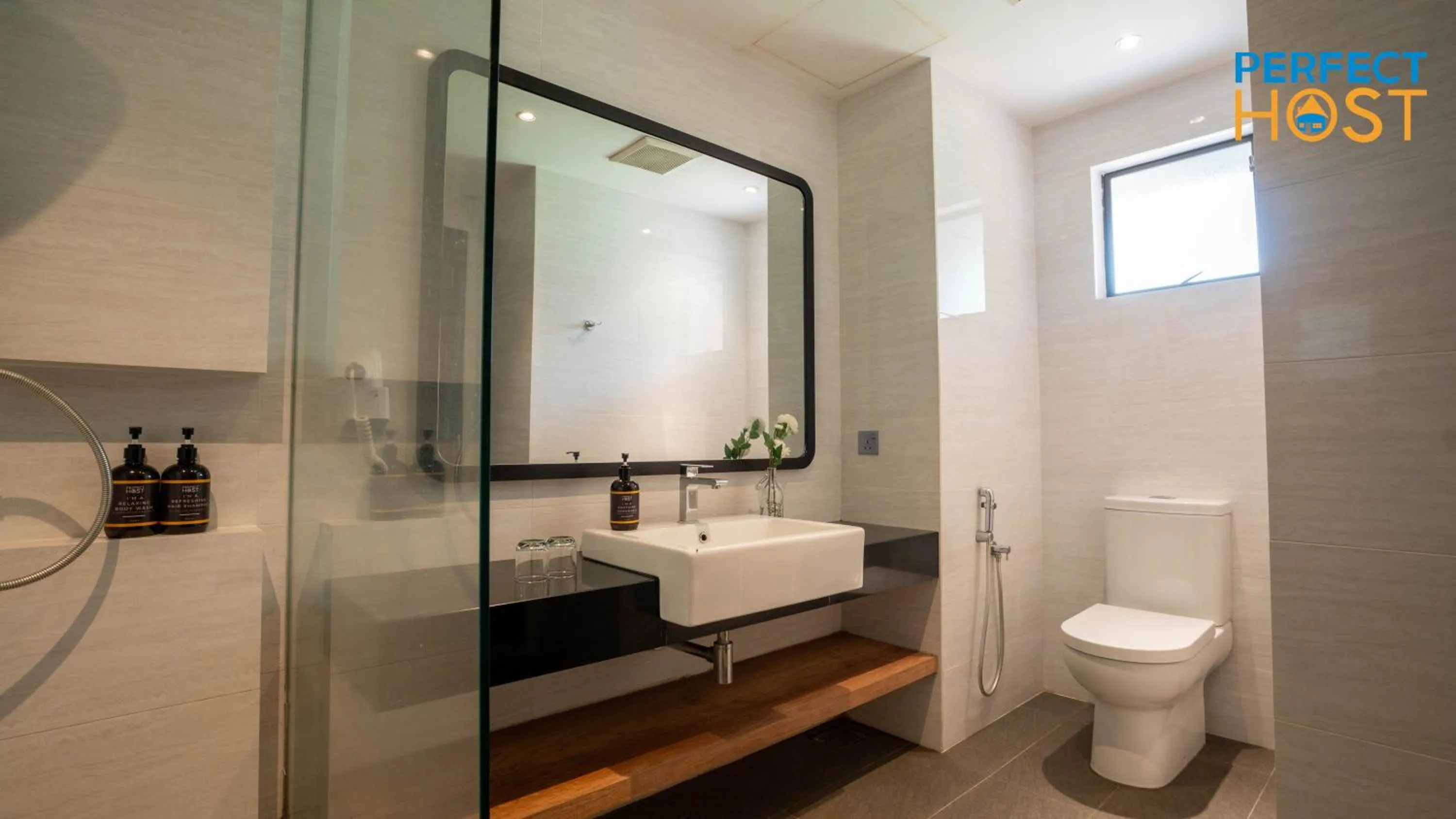 Bathroom in Damai Laut Escape by Perfect Host