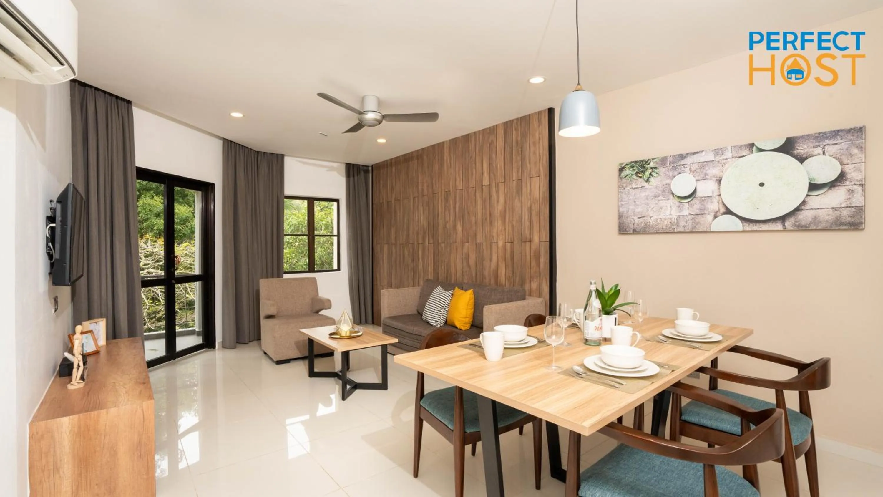 Dining area in Damai Laut Escape by Perfect Host