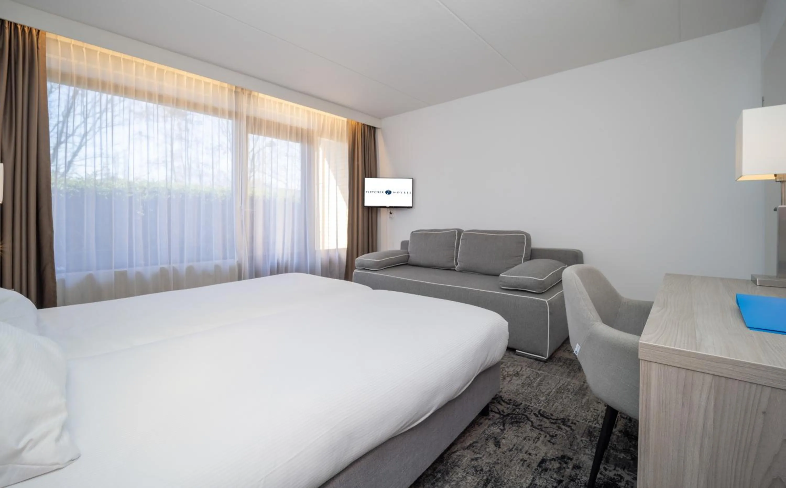 Bedroom in Fletcher Hotel - Restaurant Heiloo