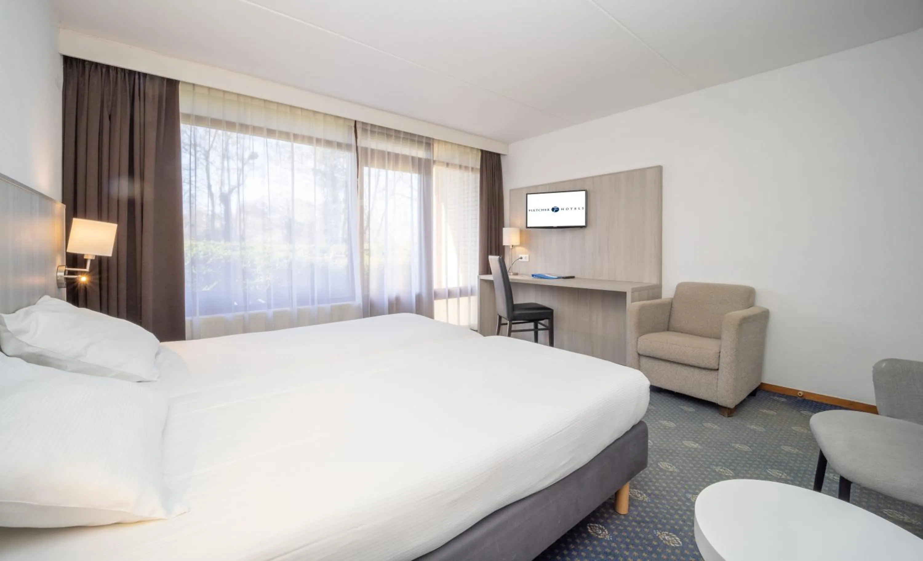 Bedroom in Fletcher Hotel - Restaurant Heiloo