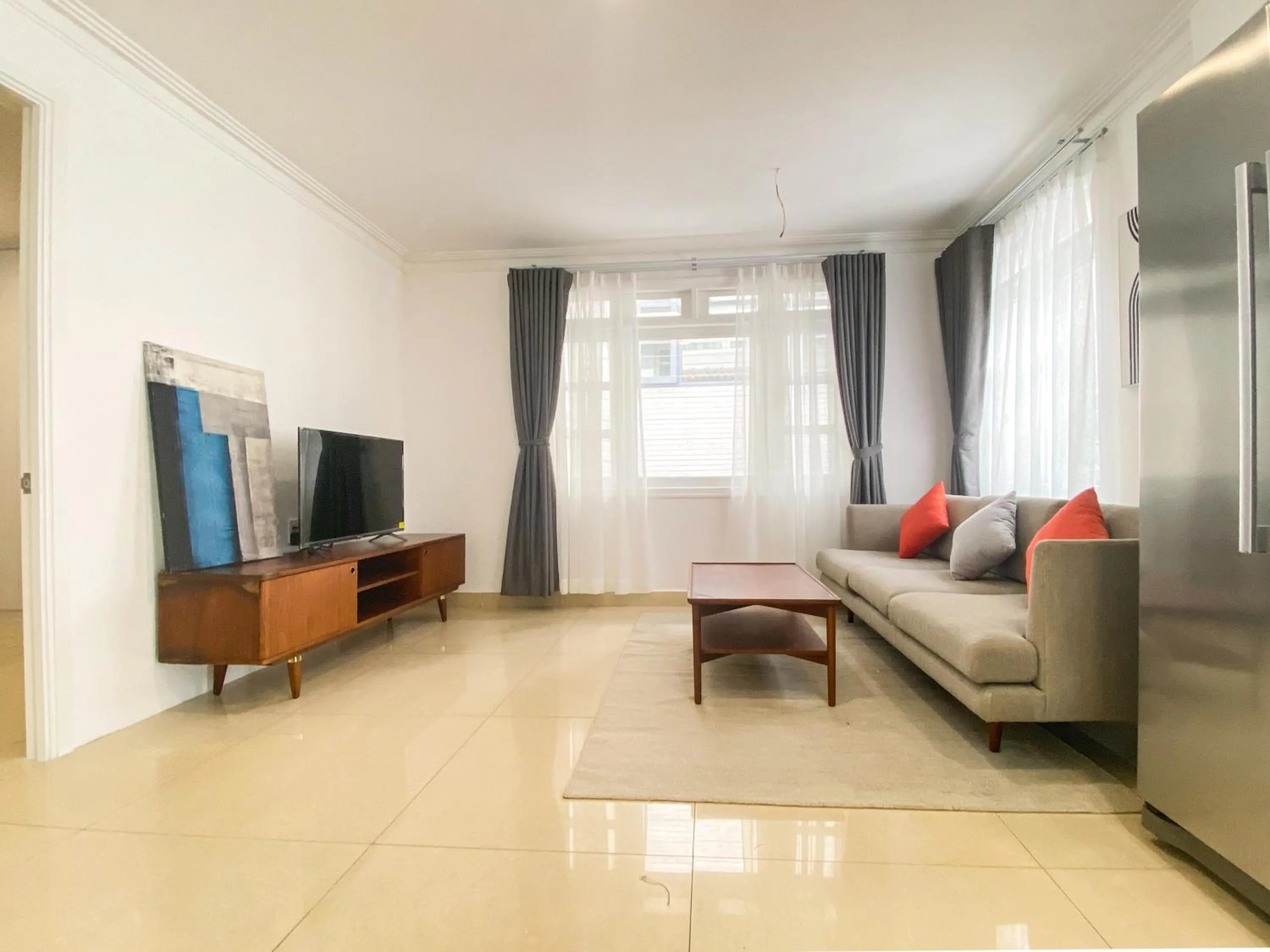 Communal lounge/ TV room in Zeus Living - Room in Villas An Phu