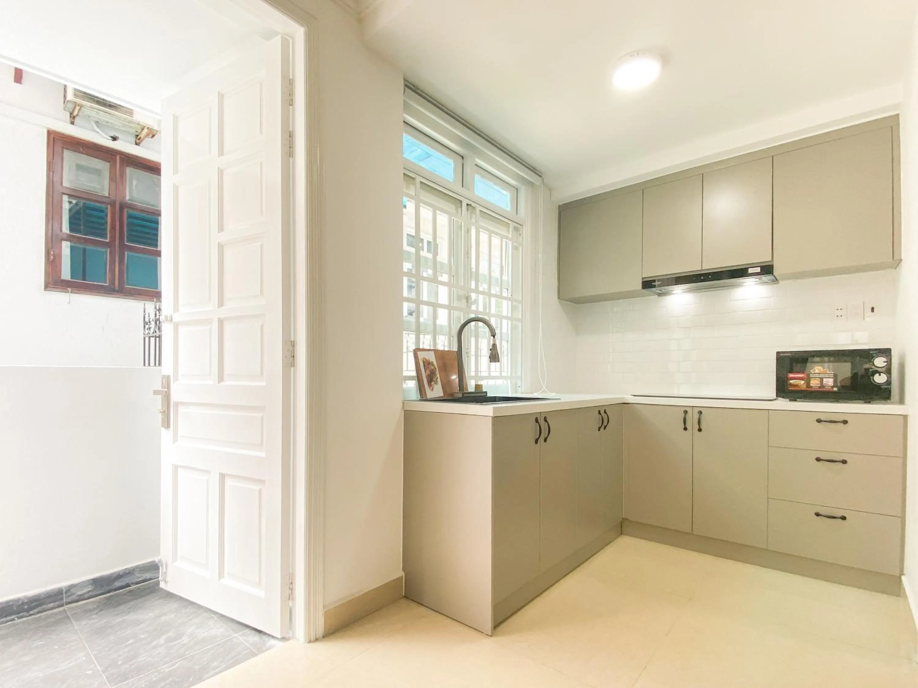 Kitchen or kitchenette in Zeus Living - Room in Villas An Phu