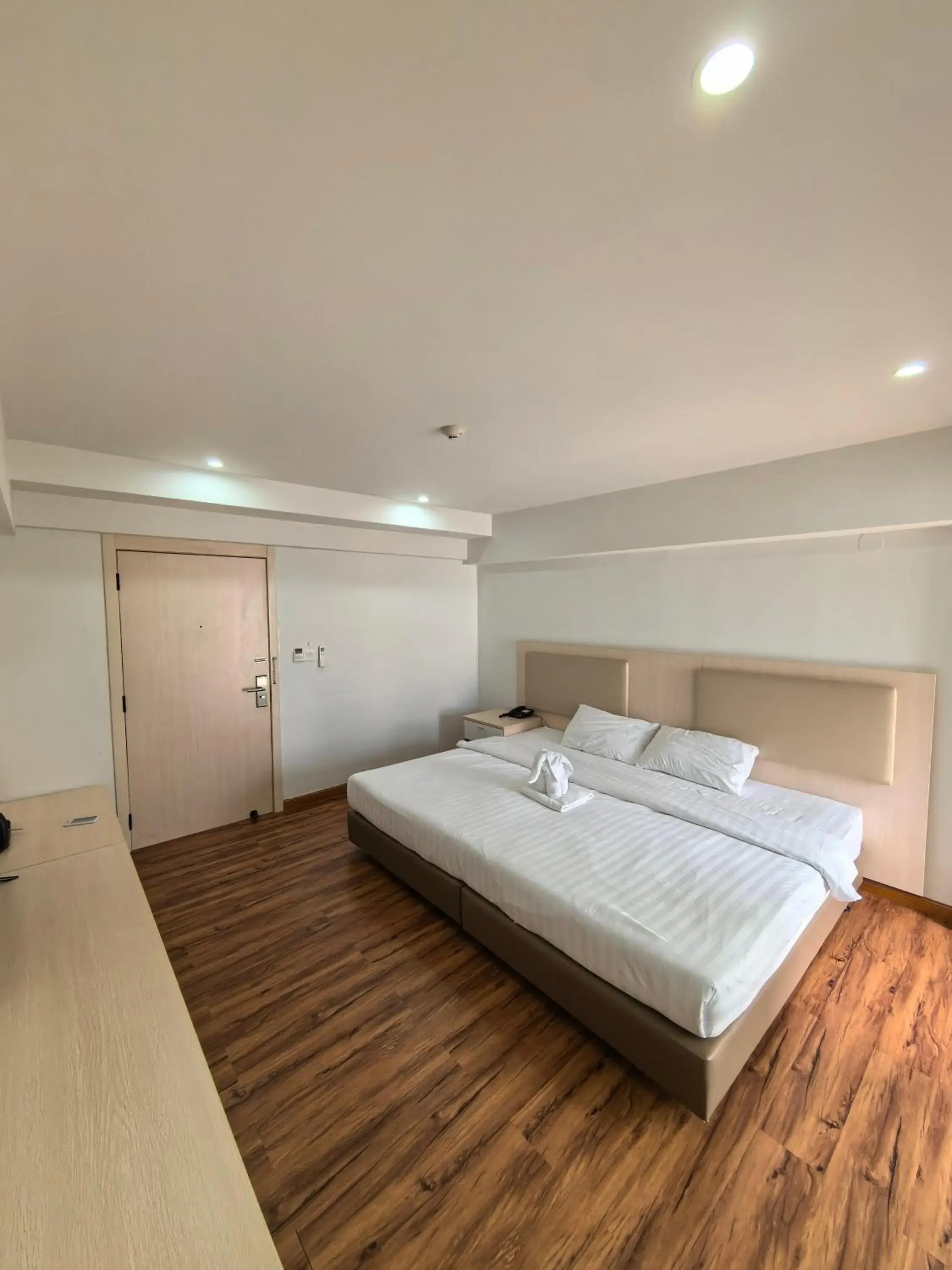 Property building, Bed in Lucky Elephant Hotel Property building, Bed in Lucky Elephant Hotel