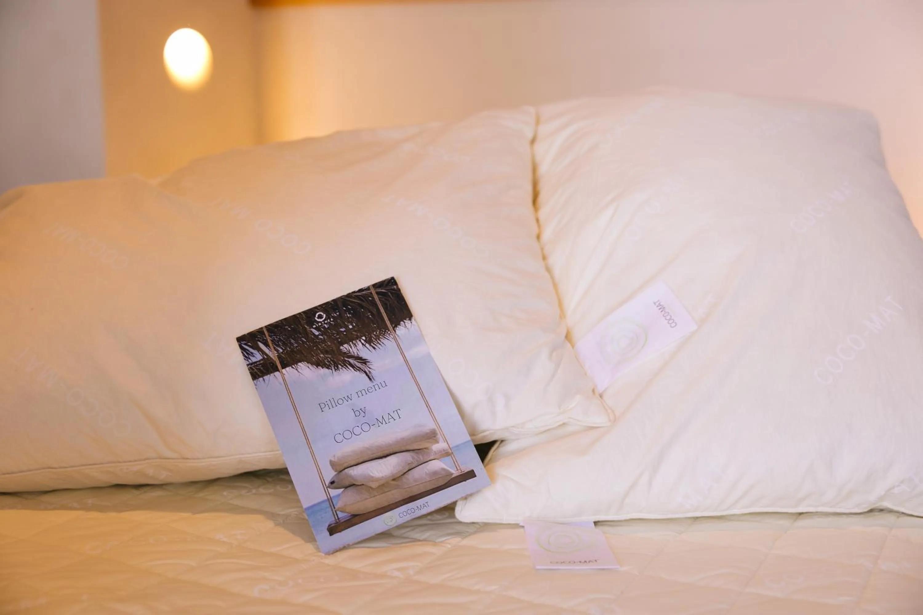 Bed in Mirthea Suites