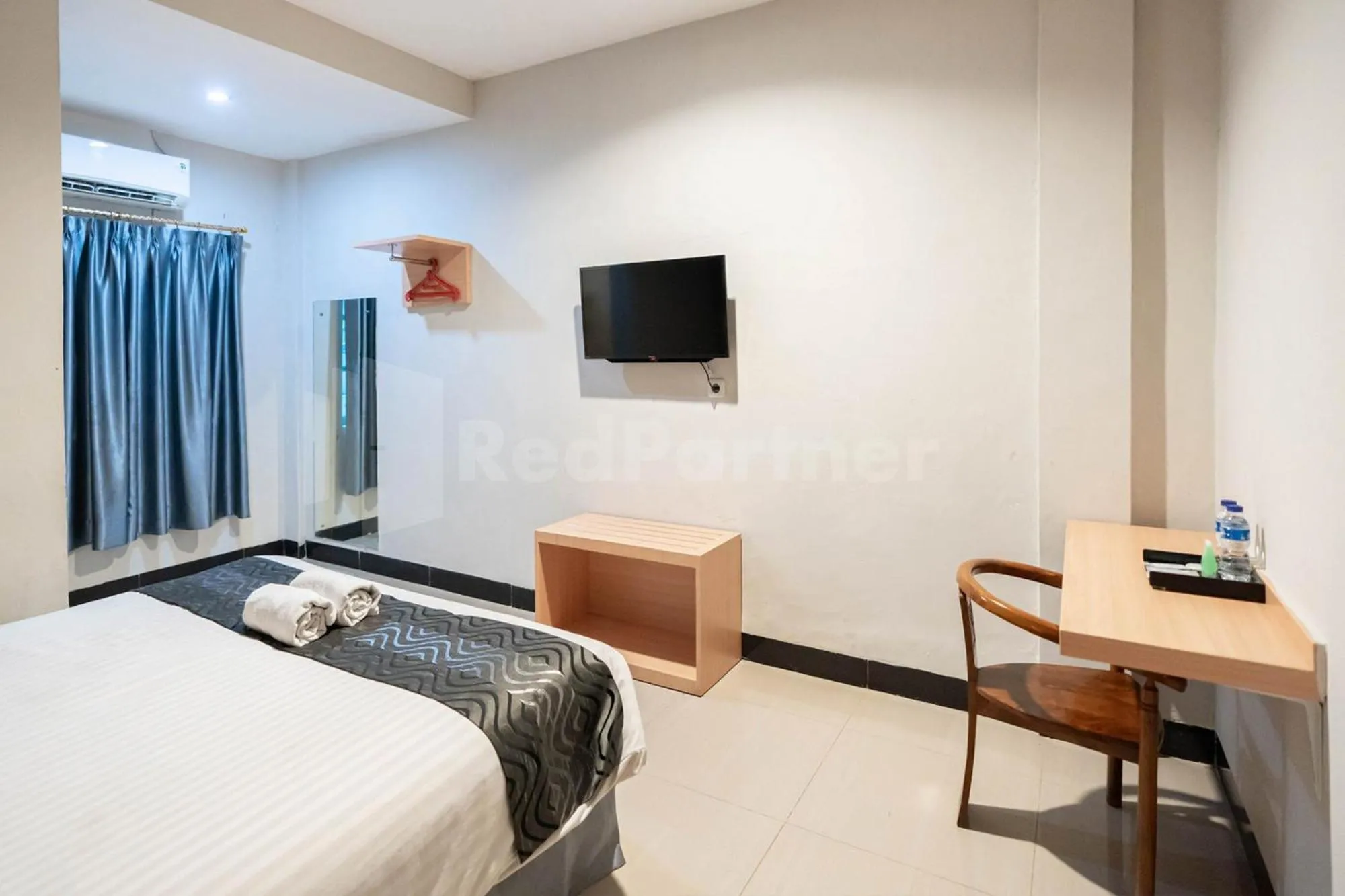 Bed in New Gentala Hotel Medan RedPartner