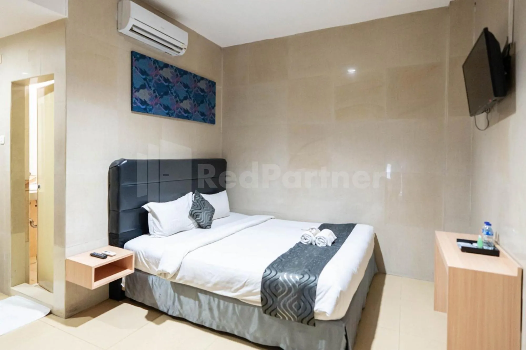 Bed in New Gentala Hotel Medan RedPartner