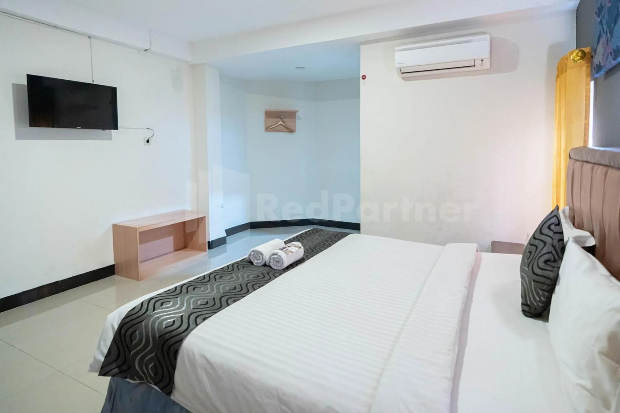 Bed in New Gentala Hotel Medan RedPartner