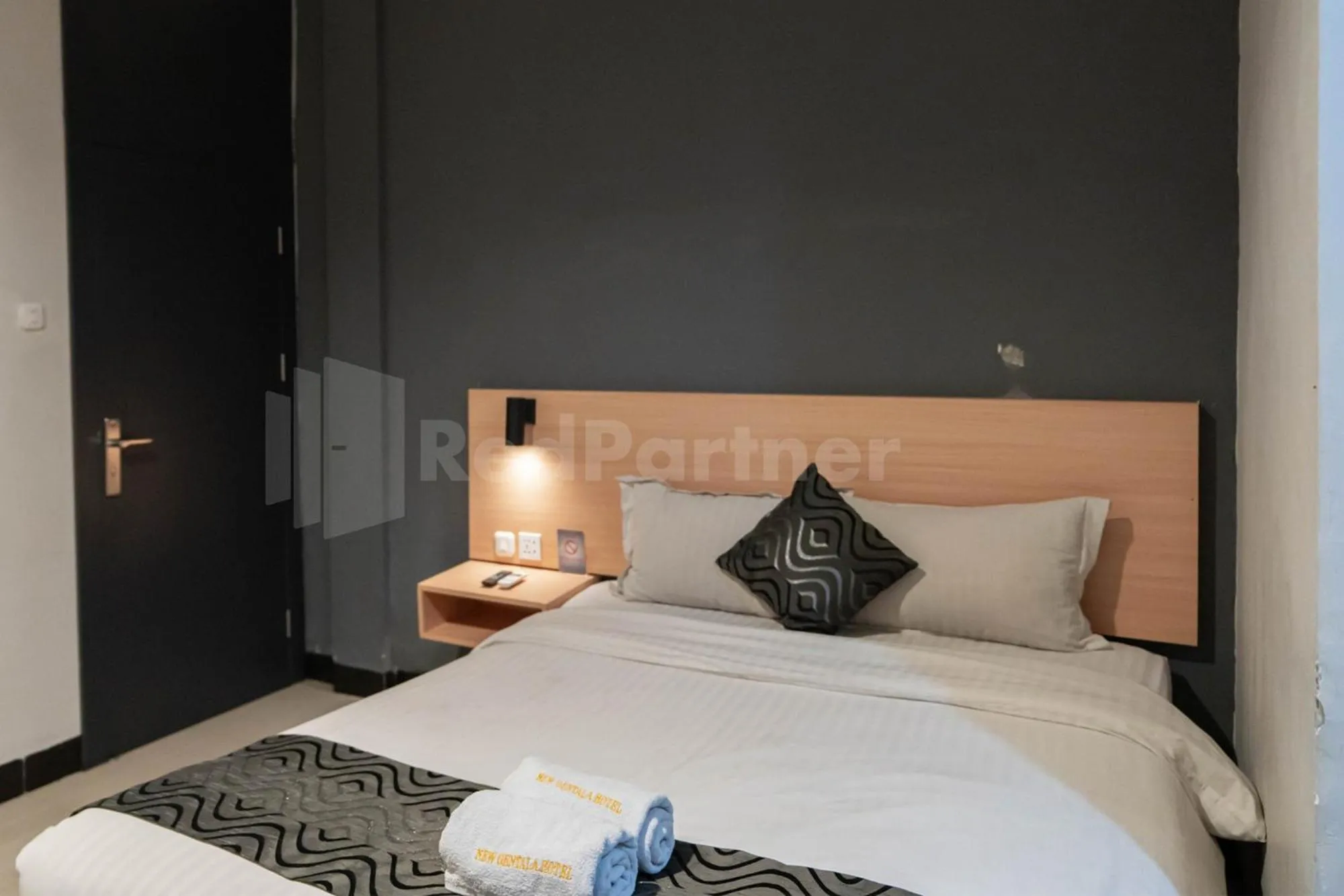 Bed in New Gentala Hotel Medan RedPartner