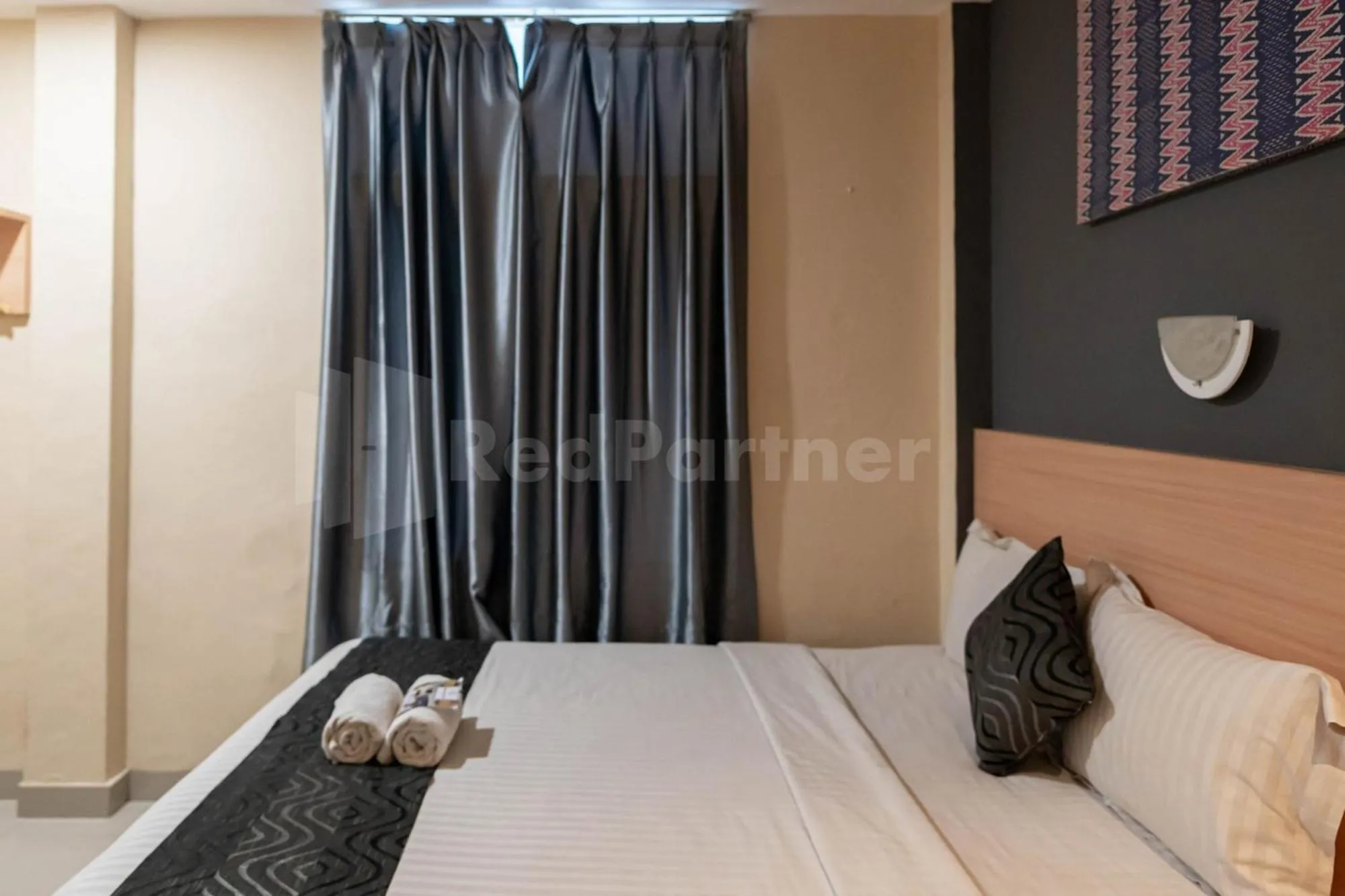 Bed in New Gentala Hotel Medan RedPartner