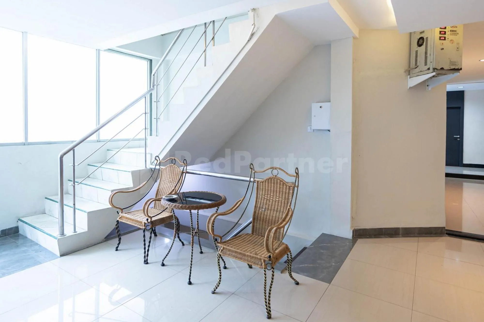 Seating area in New Gentala Hotel Medan RedPartner