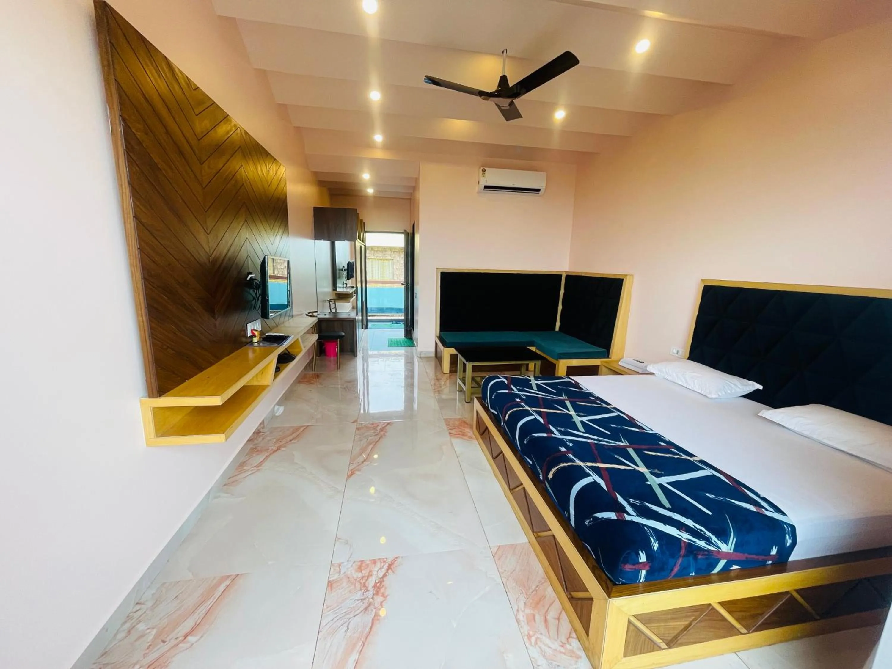 Bed in hotel saptarang residency panhala