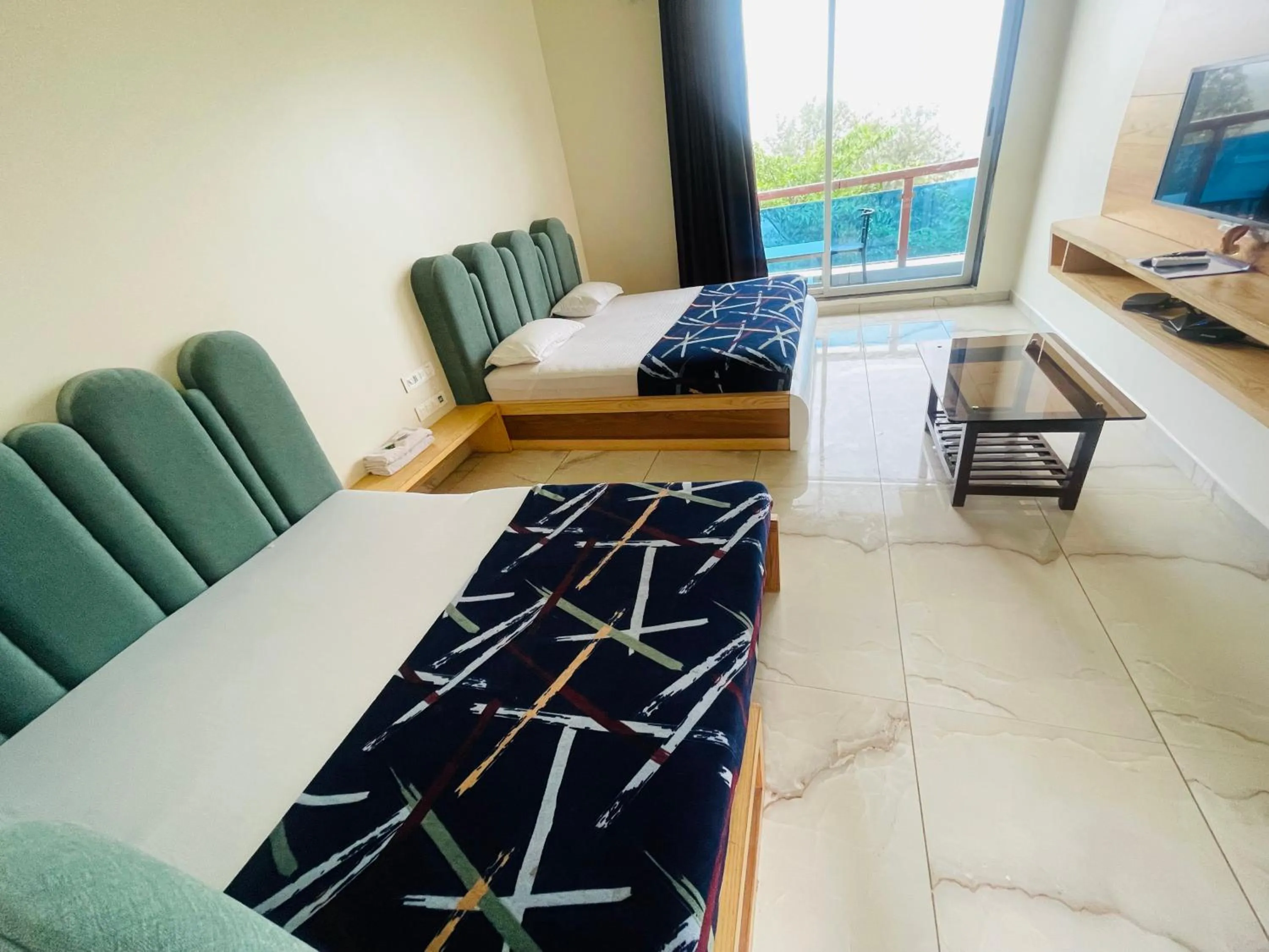 Bed in hotel saptarang residency panhala