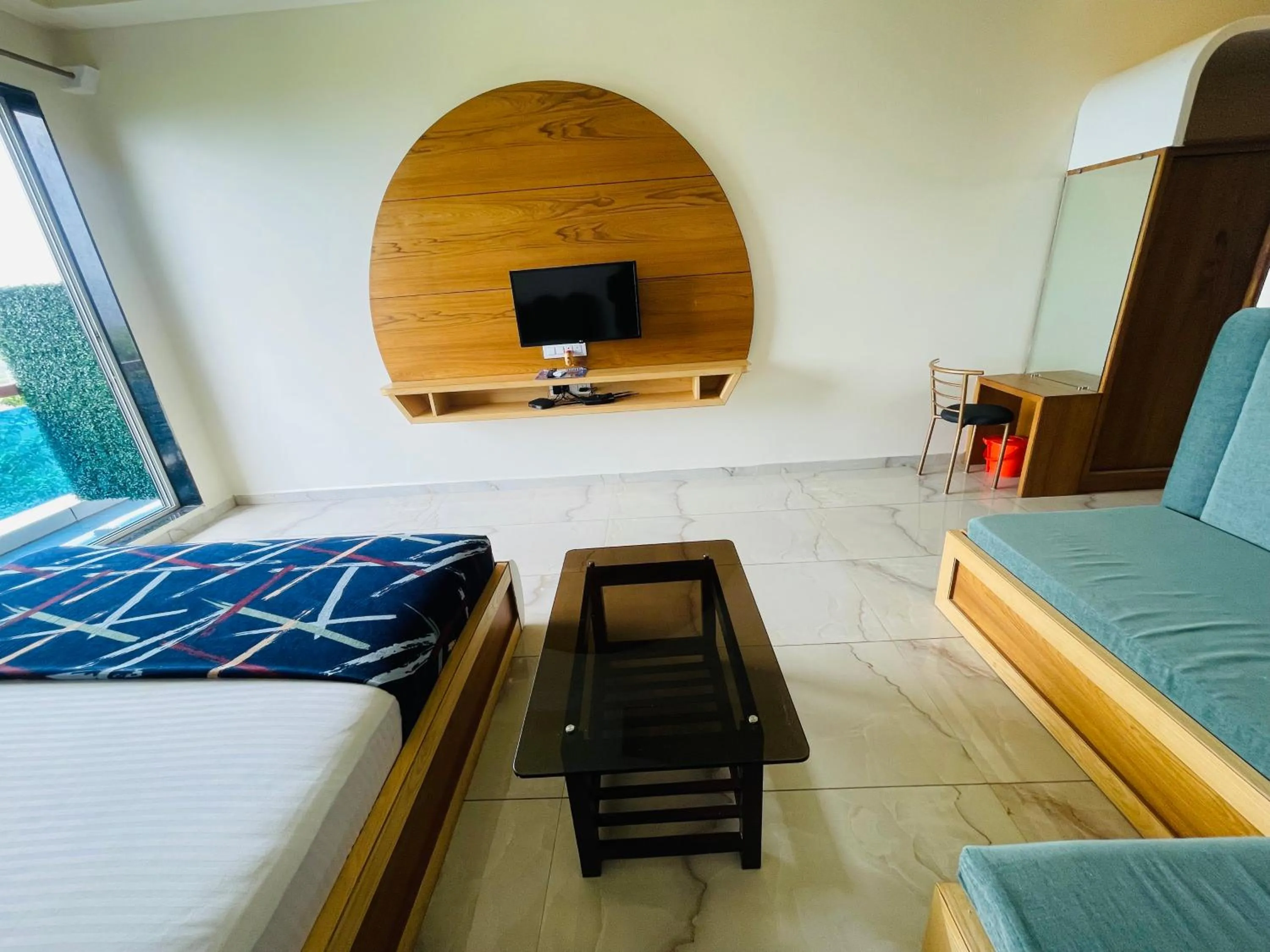 Communal lounge/ TV room, Bed in hotel saptarang residency panhala