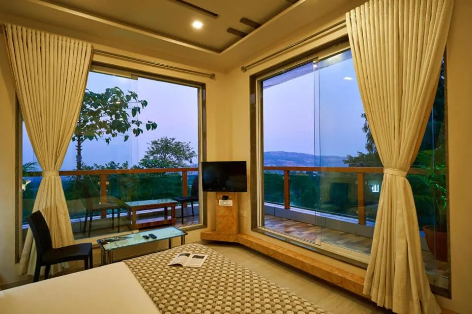 Bed in hotel saptarang residency panhala