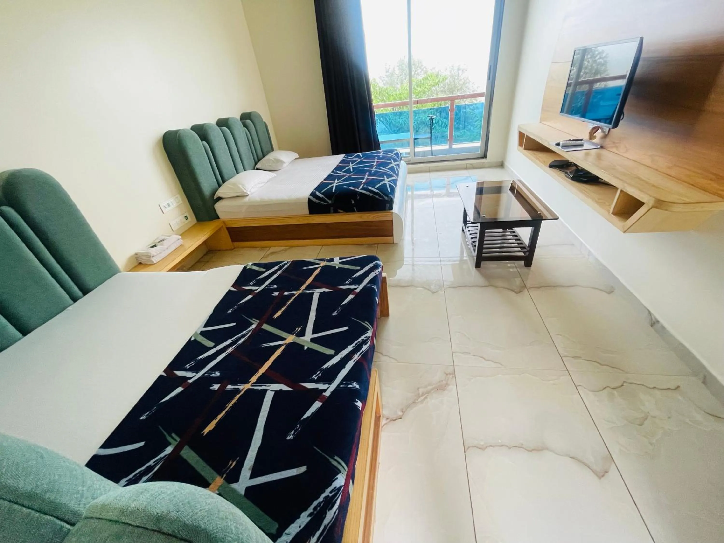 Bed in hotel saptarang residency panhala