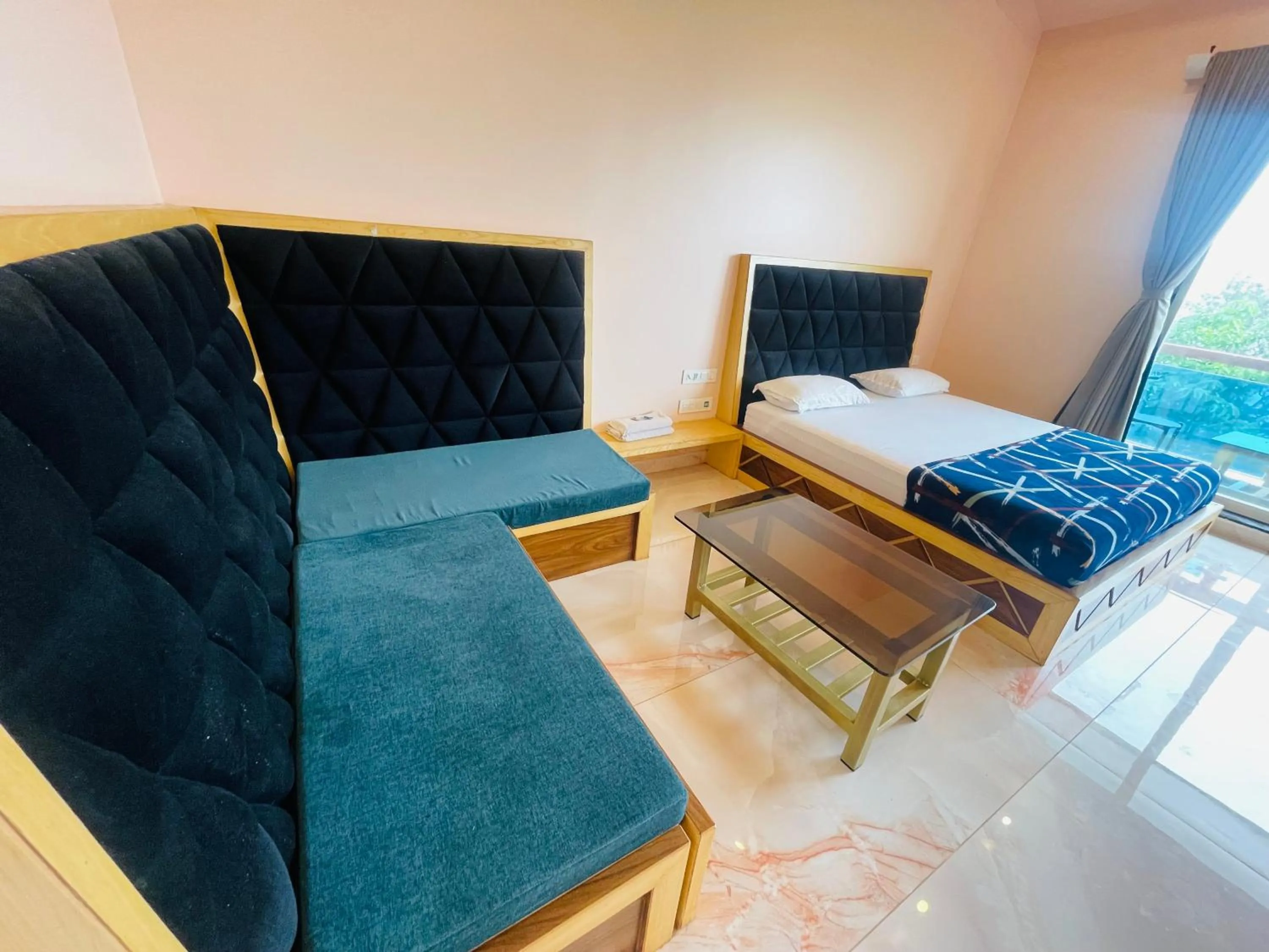 Bed in hotel saptarang residency panhala