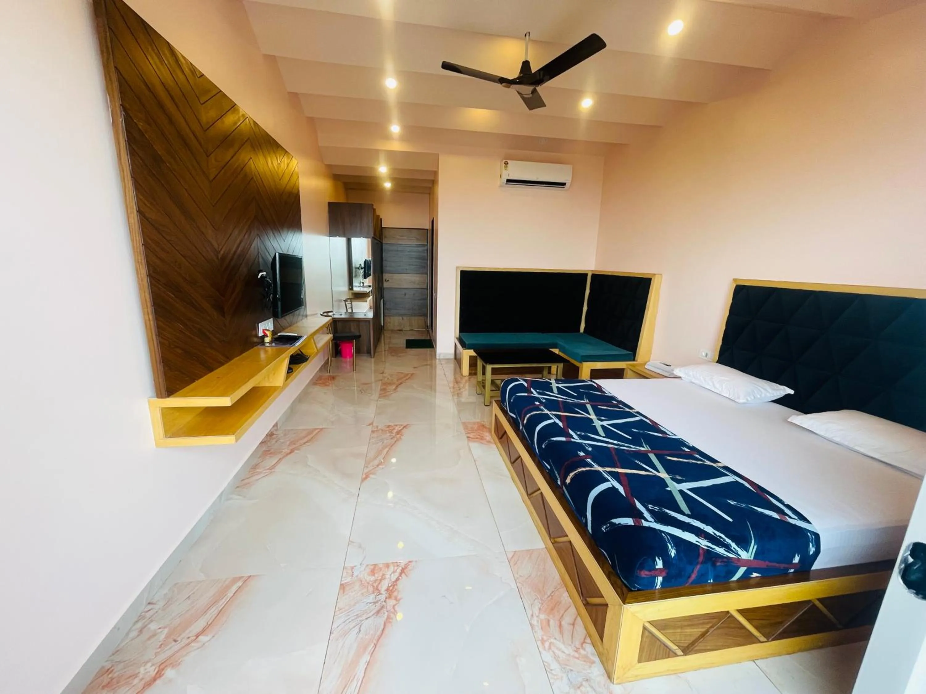 Bed in hotel saptarang residency panhala