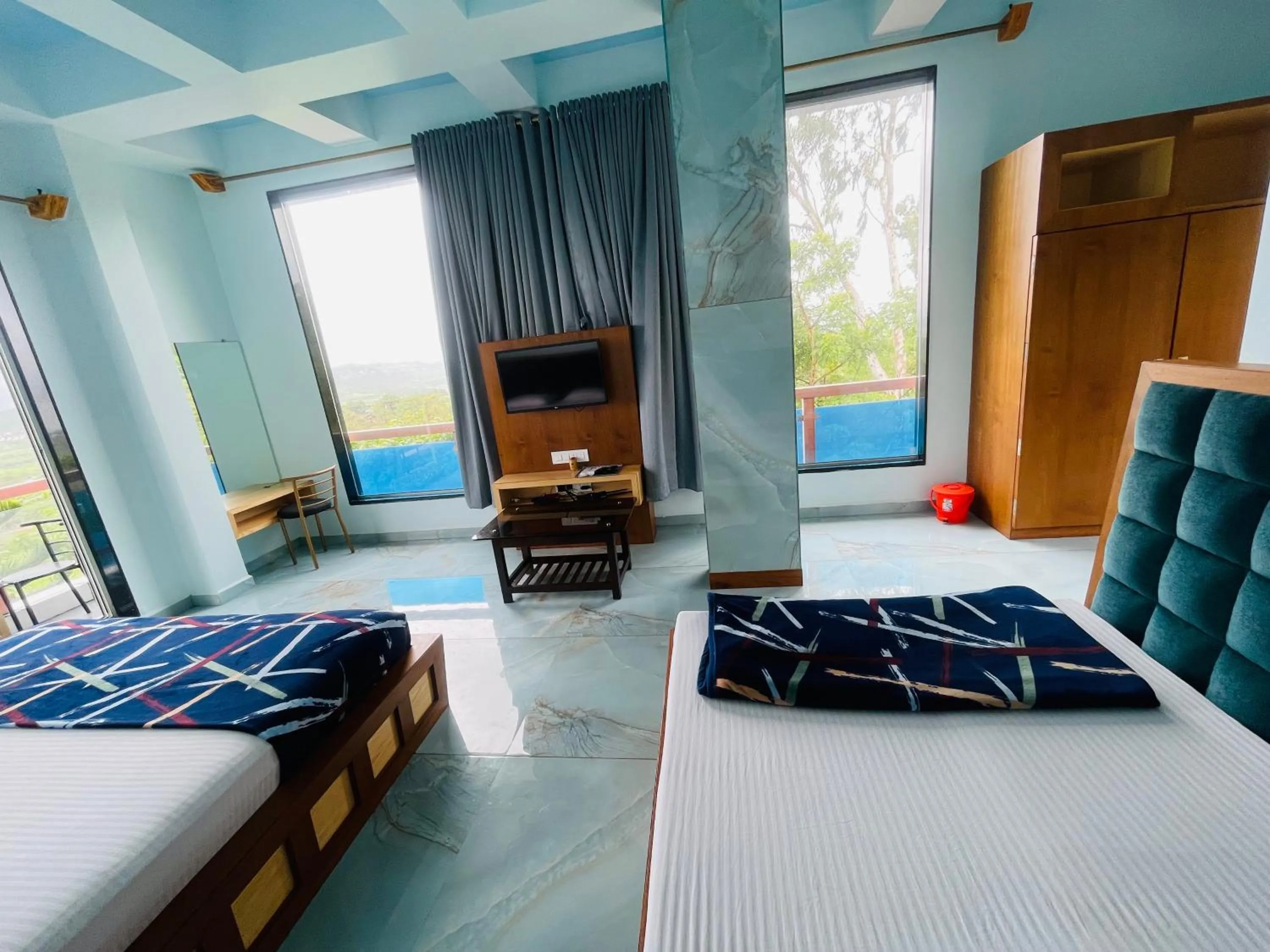 Bed in hotel saptarang residency panhala