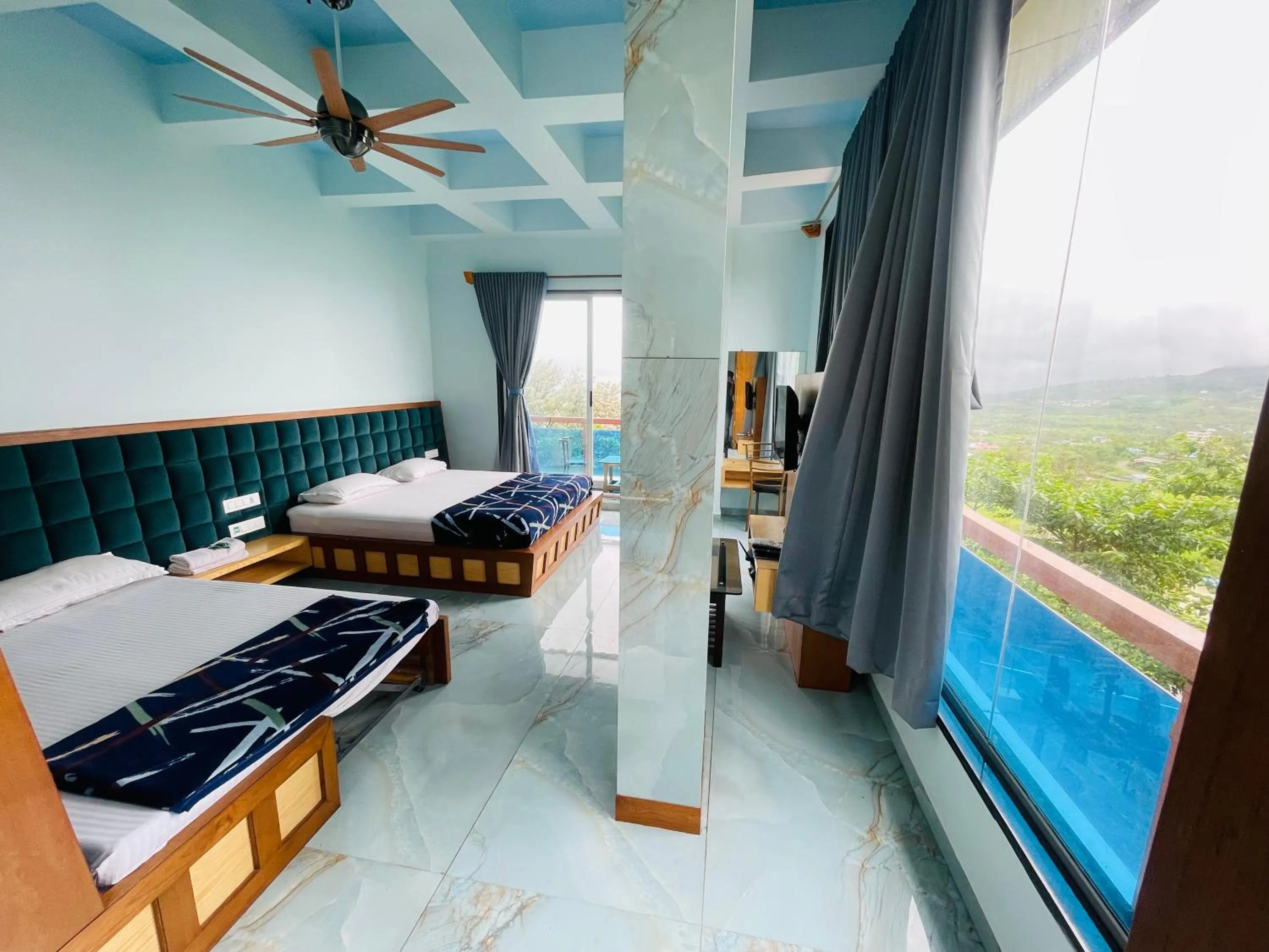 Bed in hotel saptarang residency panhala