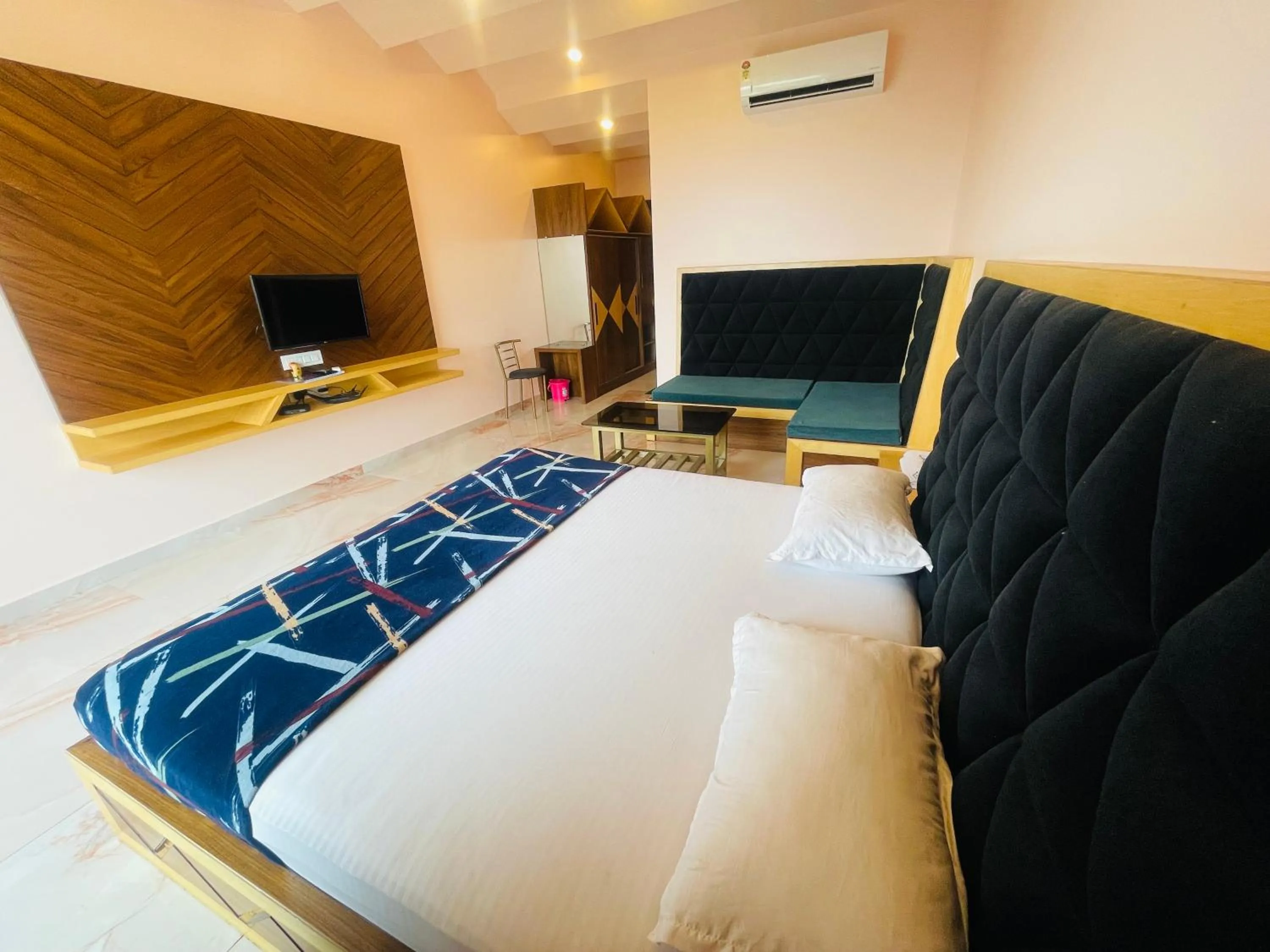 Bed in hotel saptarang residency panhala