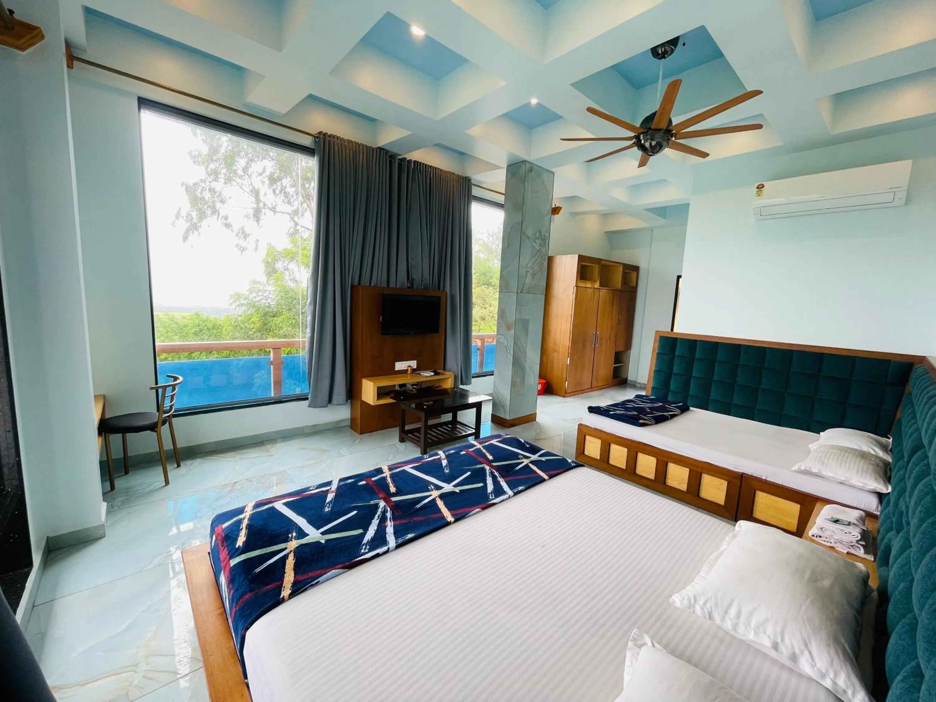 Bed in hotel saptarang residency panhala