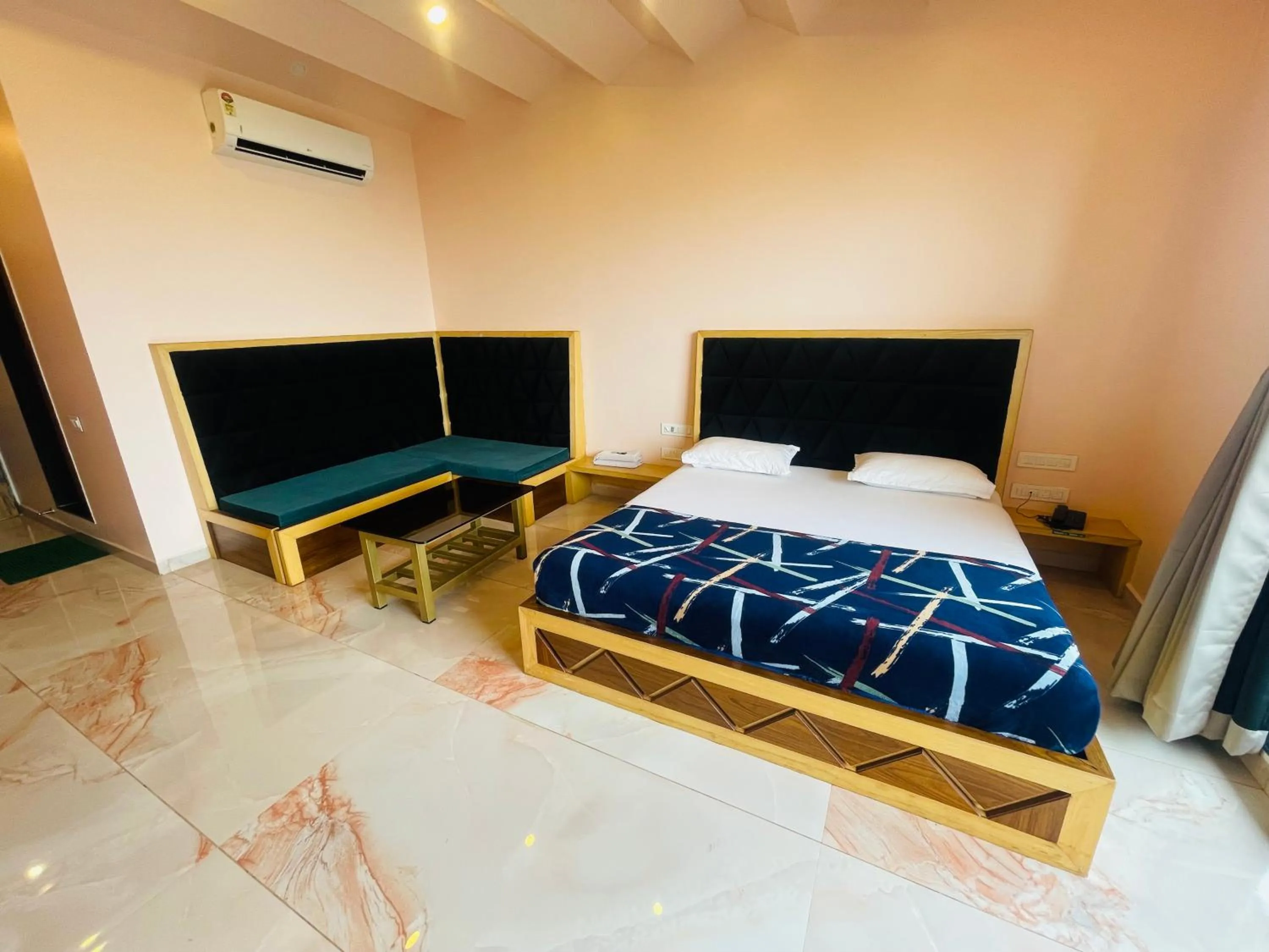 Bed in hotel saptarang residency panhala