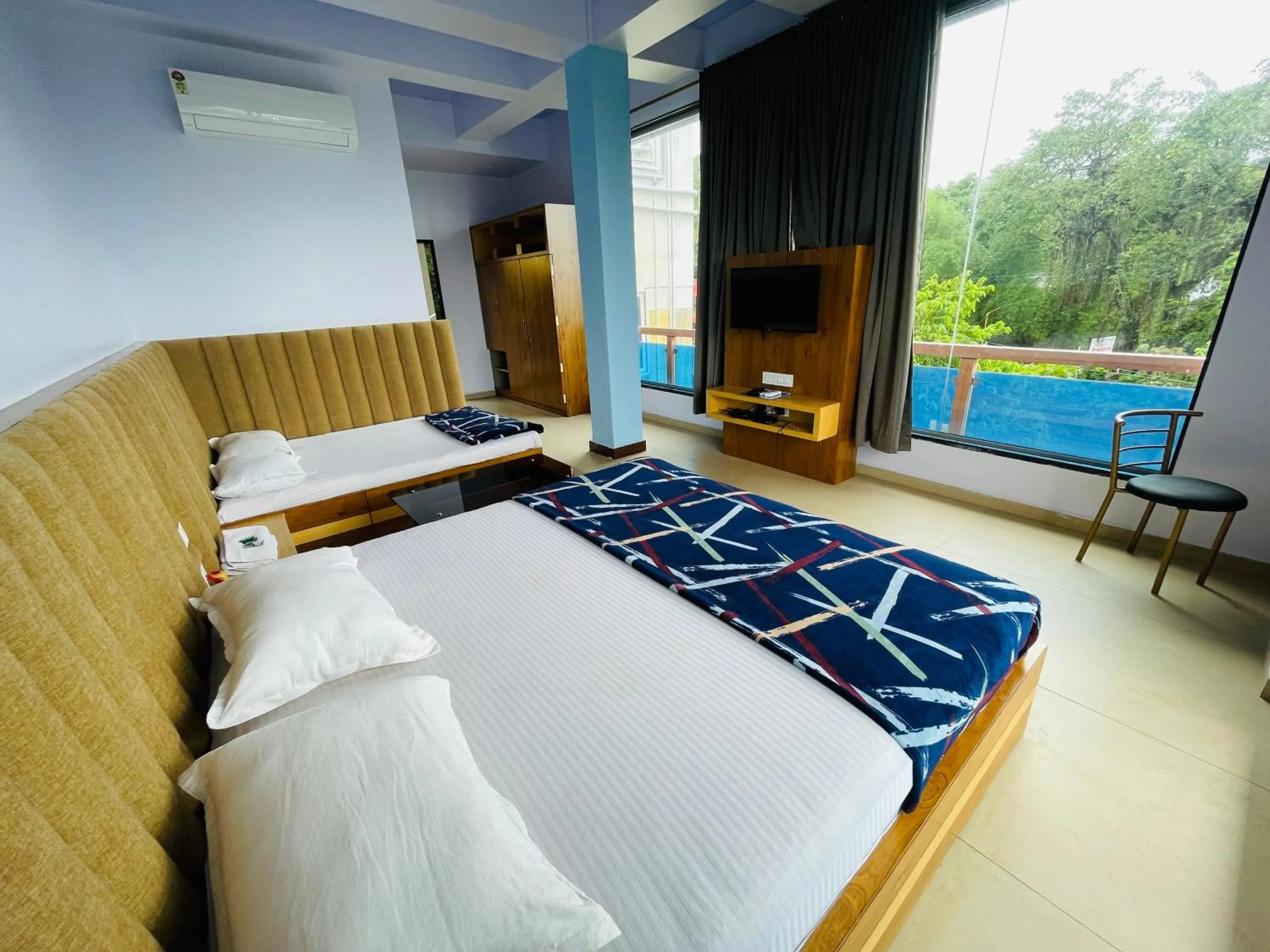Bed in hotel saptarang residency panhala