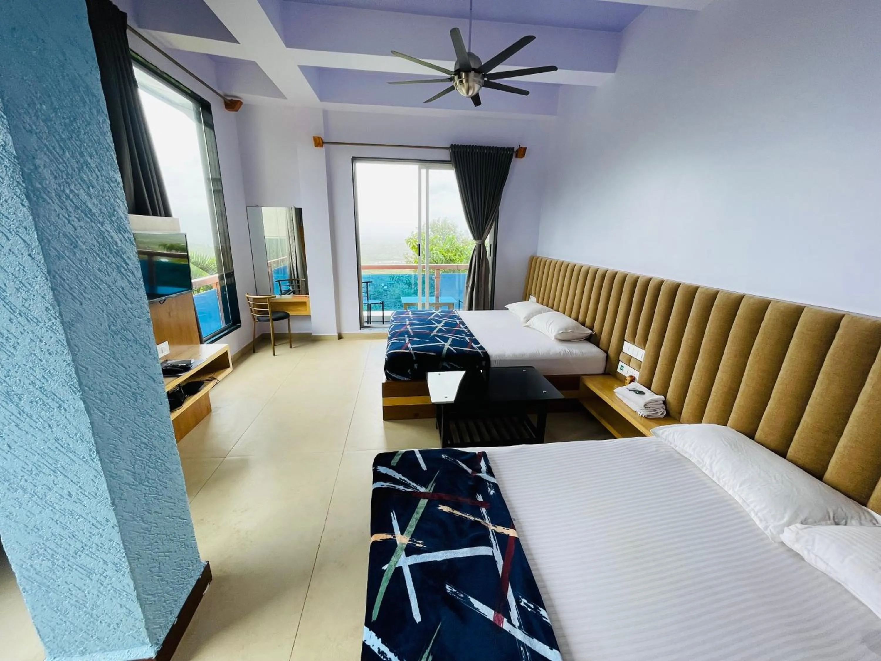 Bed in hotel saptarang residency panhala