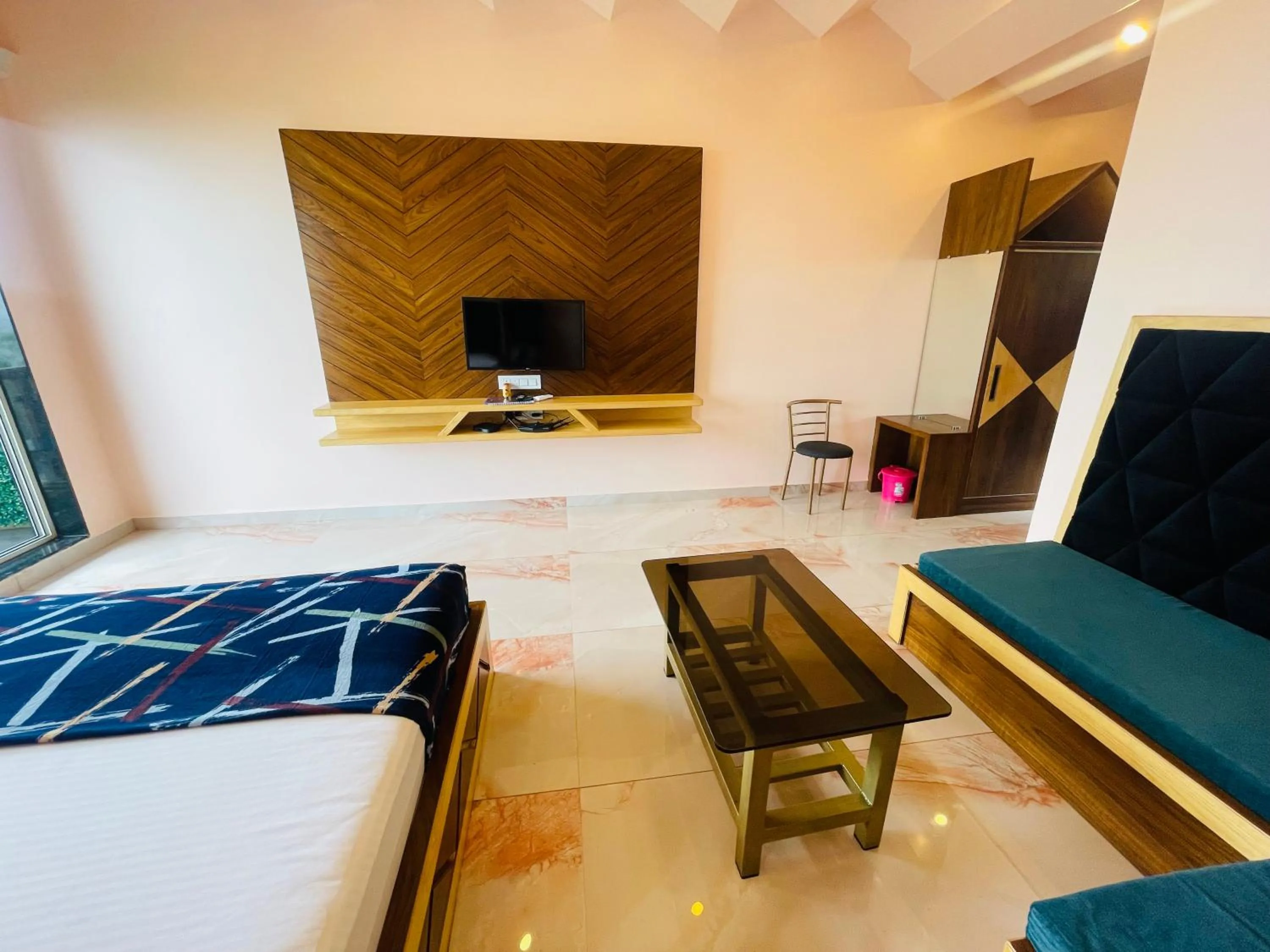 Bed in hotel saptarang residency panhala