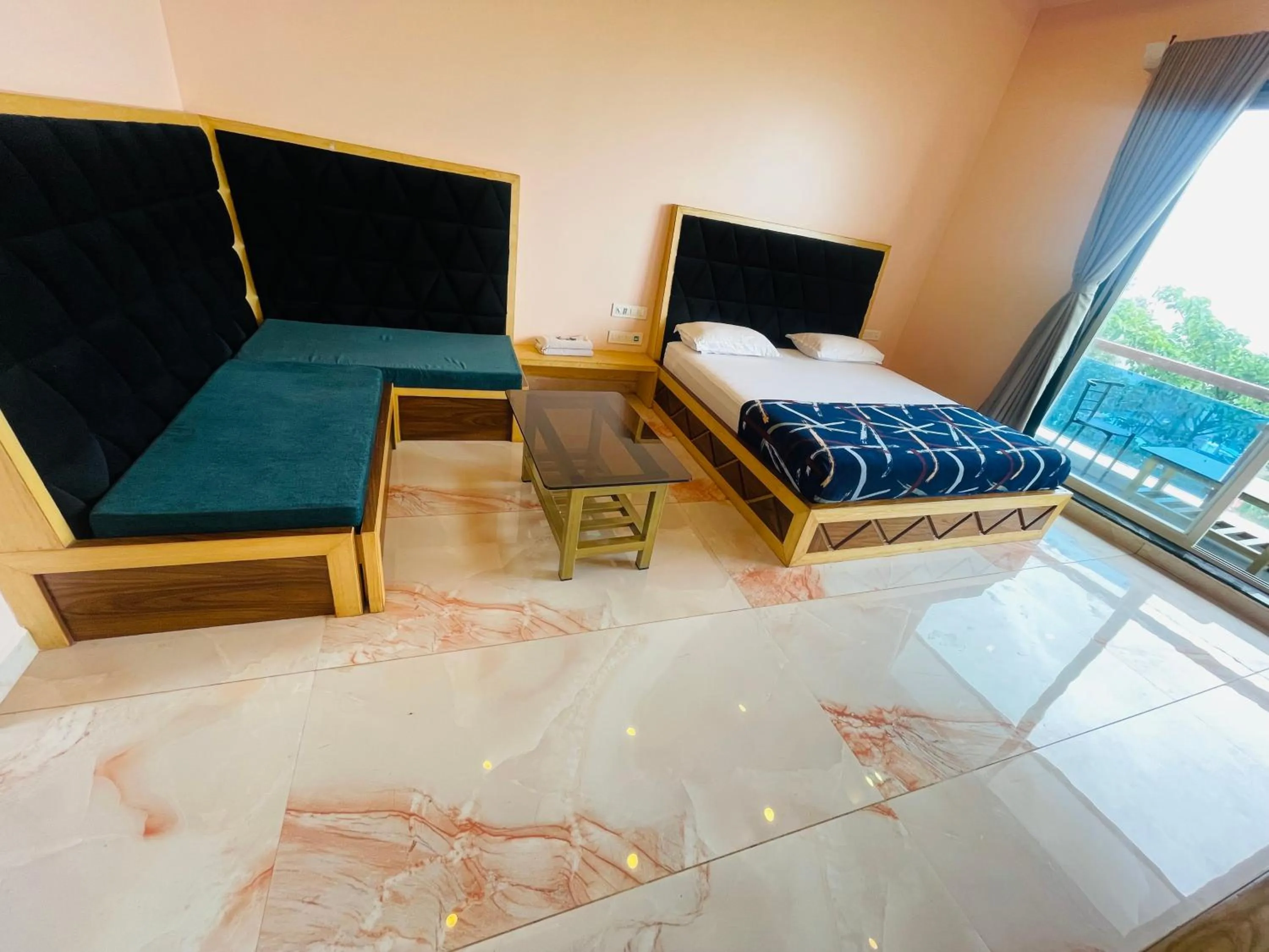 Bed in hotel saptarang residency panhala