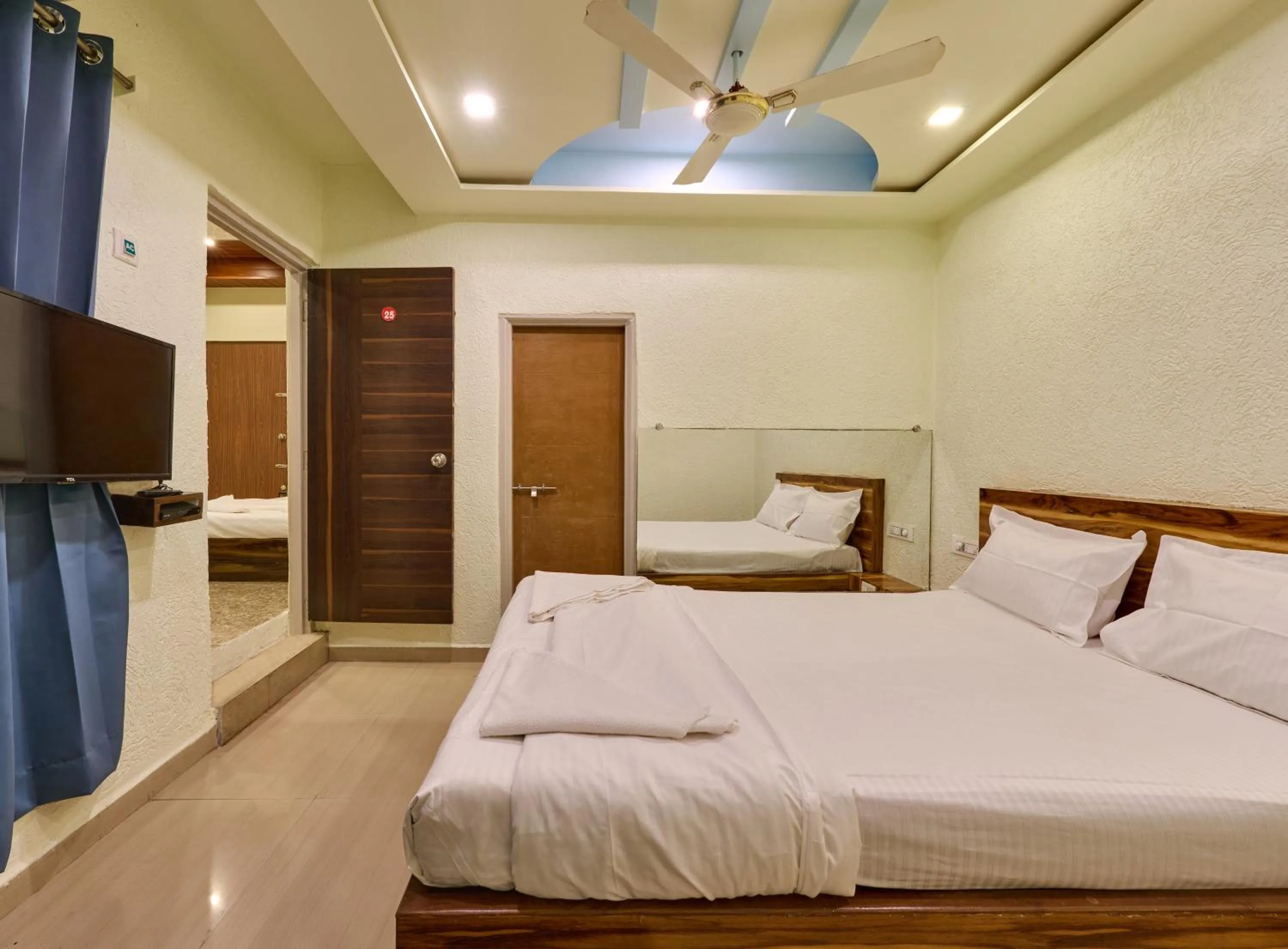 Bed in hotel saptarang residency panhala