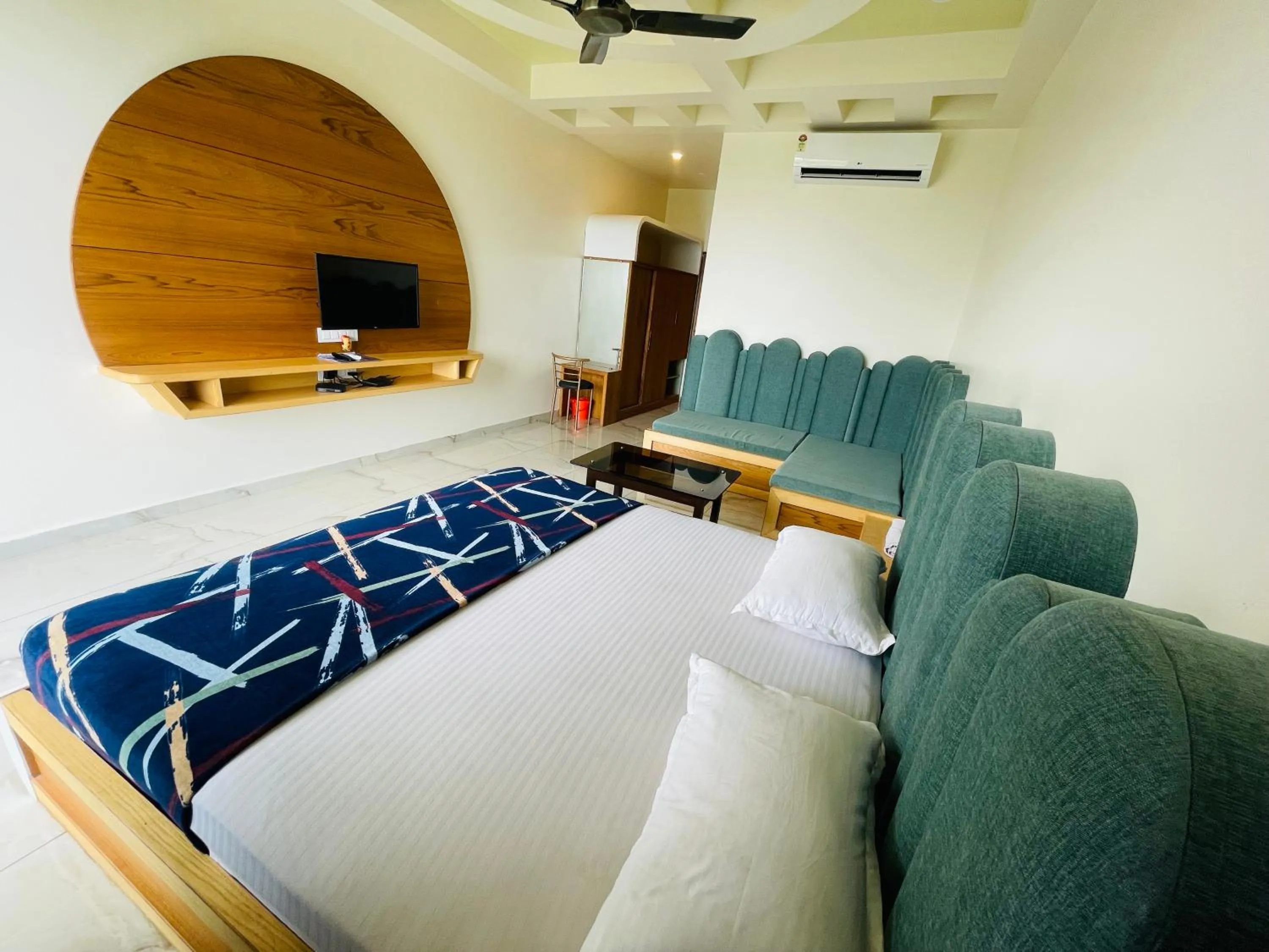 Bed in hotel saptarang residency panhala