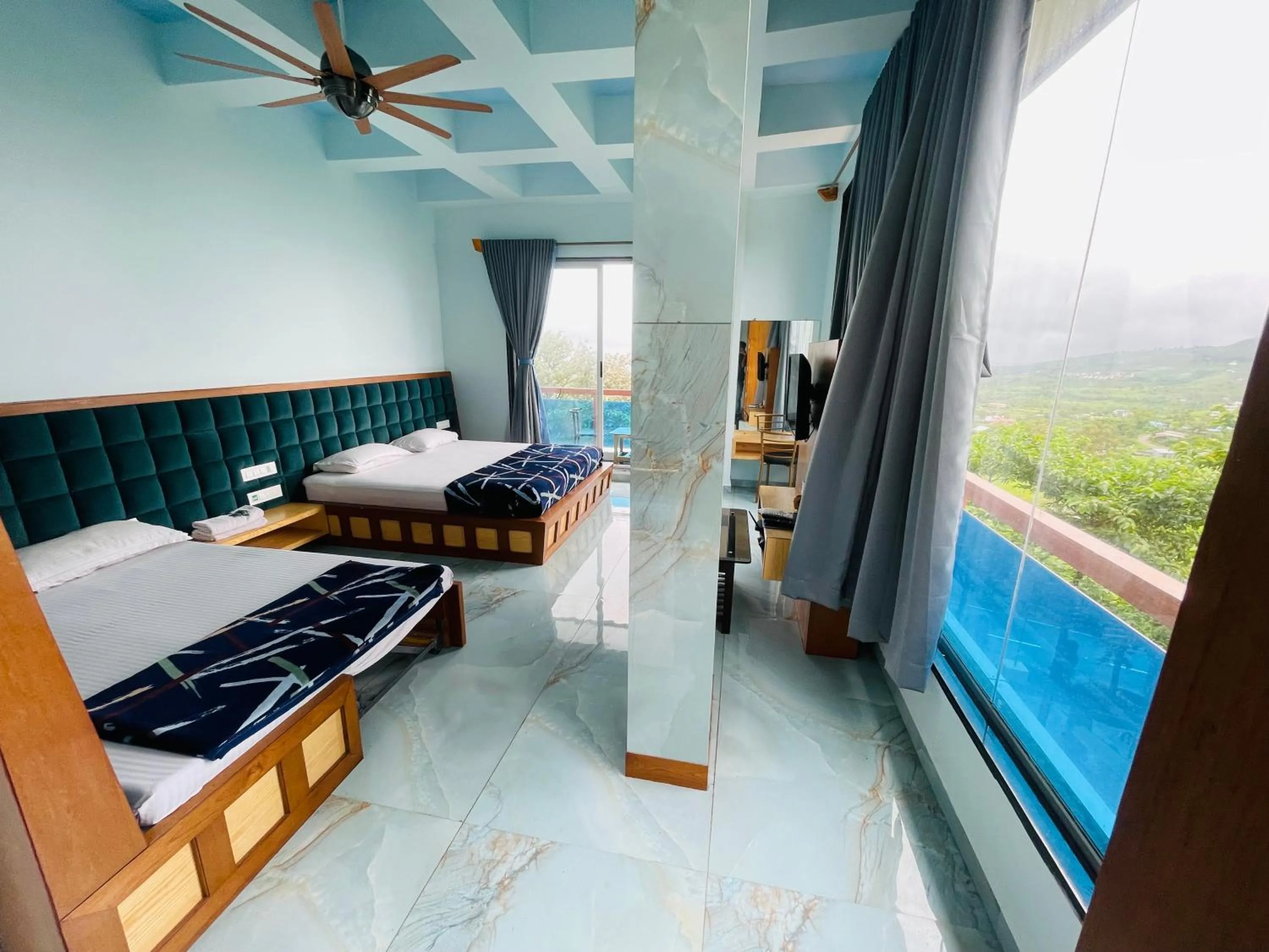 Bed in hotel saptarang residency panhala