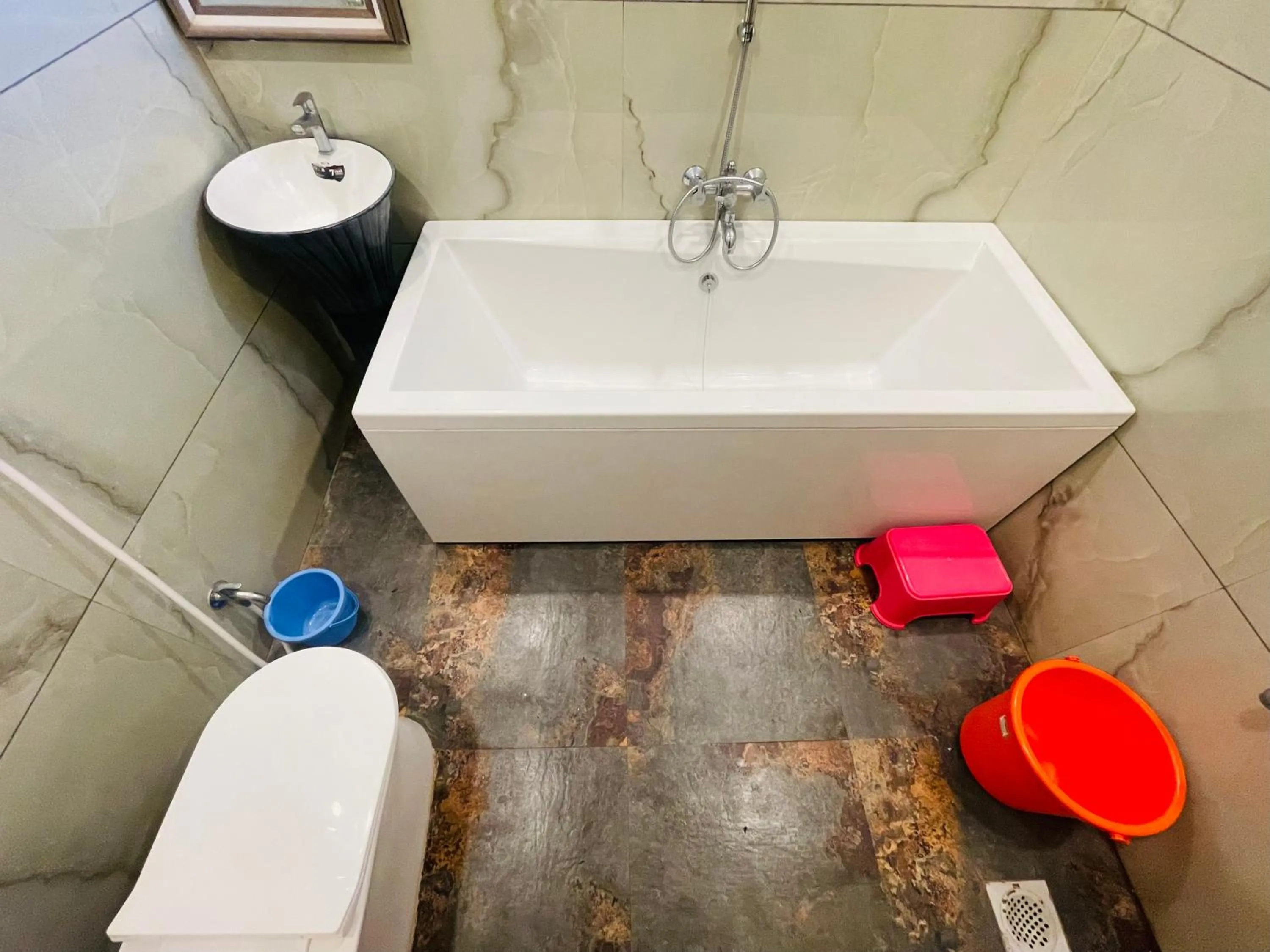 Shower in hotel saptarang residency panhala