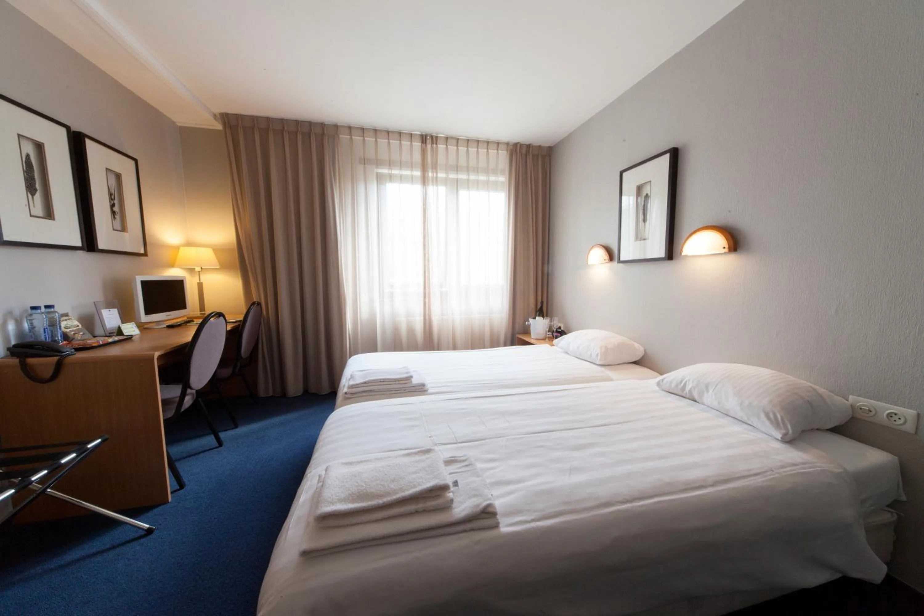 Photo of the whole room, Bed in Fletcher Hotel Restaurant Hellendoorn