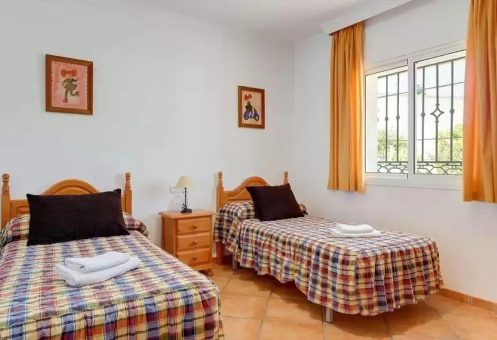 Bedroom, Bed in Villa Pastora