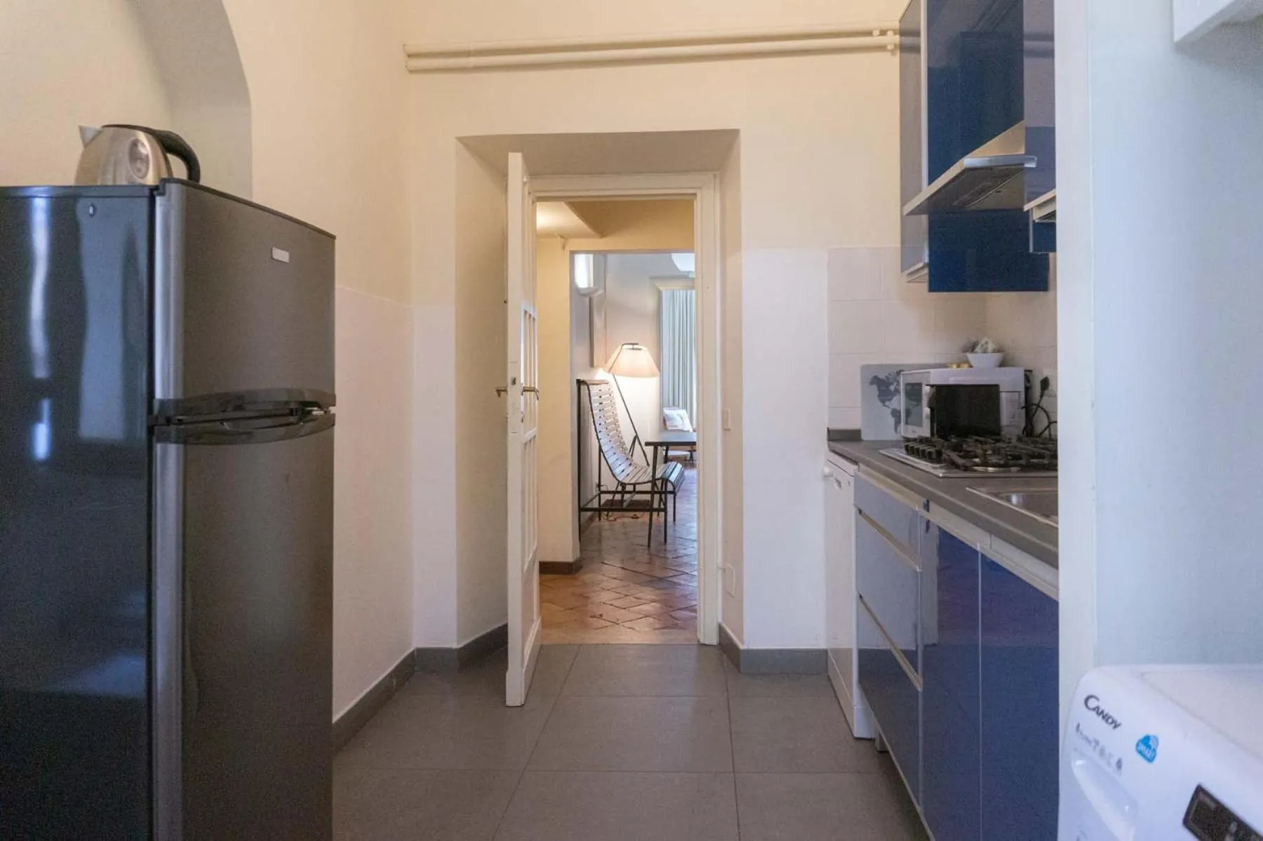 Kitchen or kitchenette in EasyTopStay - Piazza Navona Charming Apartment