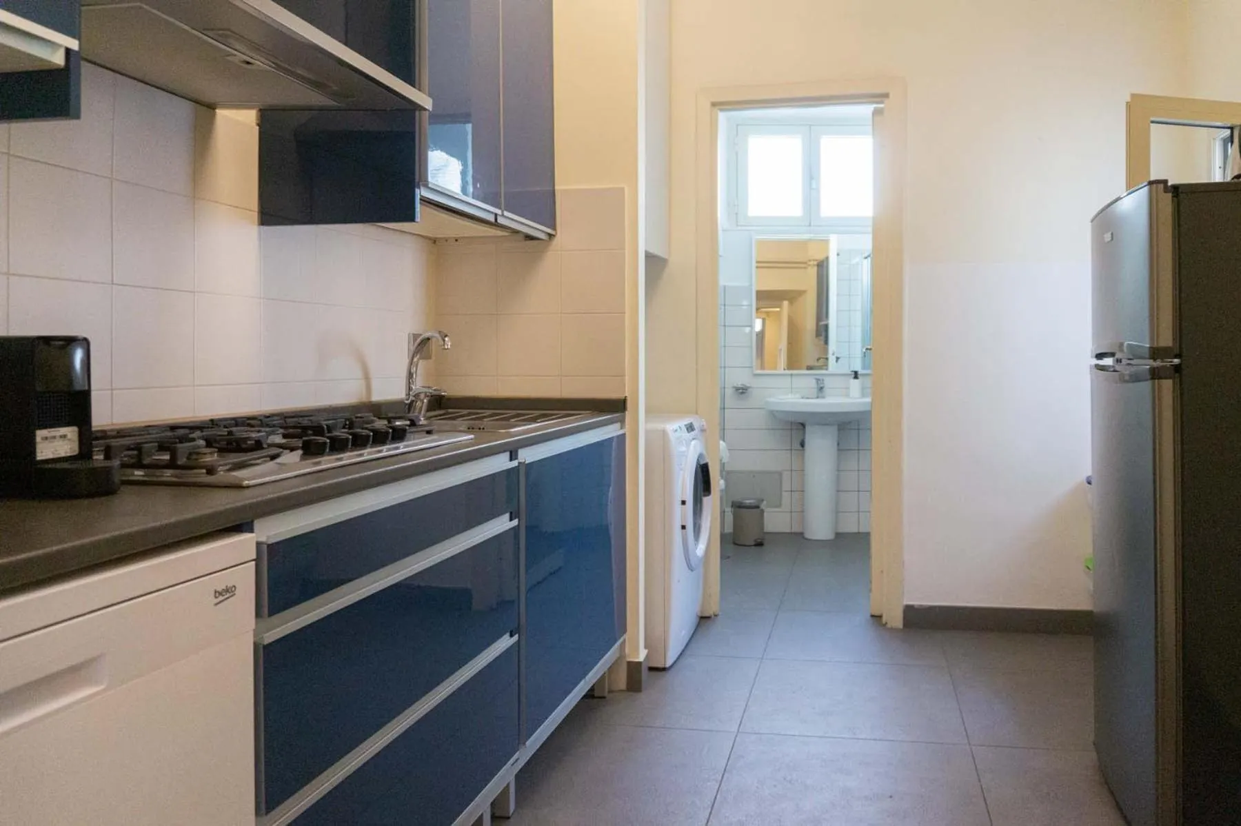 Kitchen or kitchenette in EasyTopStay - Piazza Navona Charming Apartment