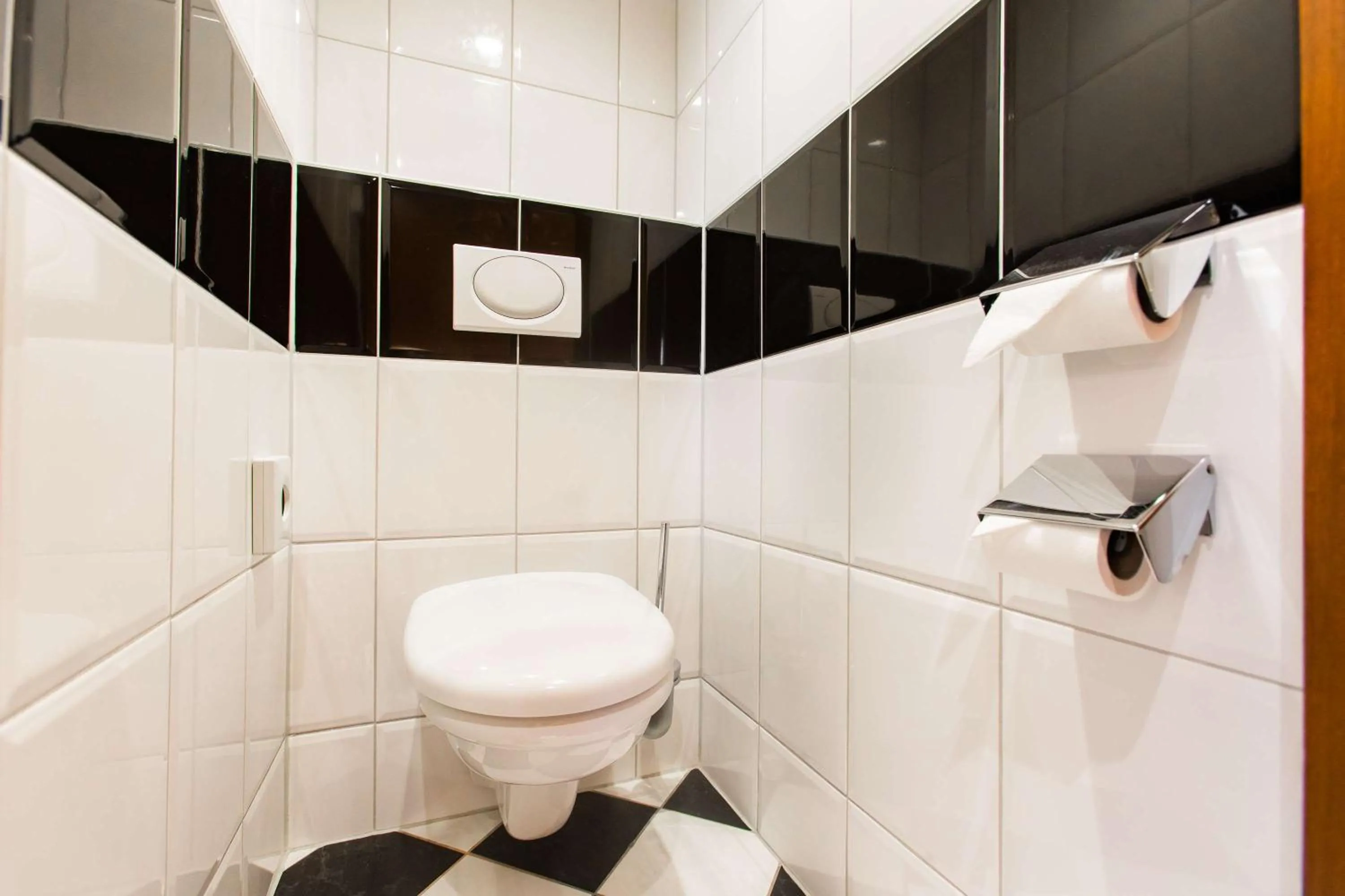 Bathroom in Golden Tulip Hotel Central