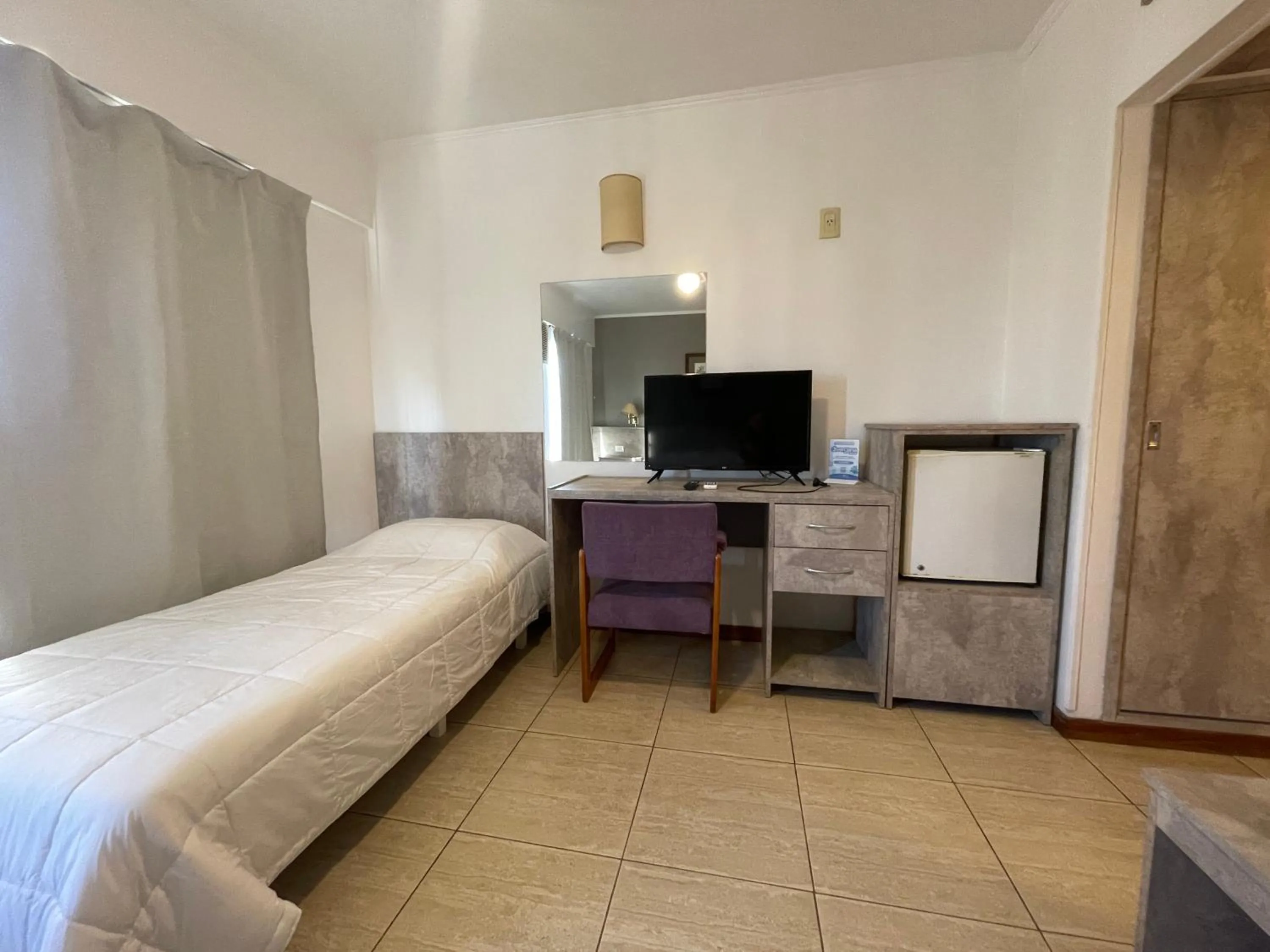 Bed in Julio Cesar Hotel