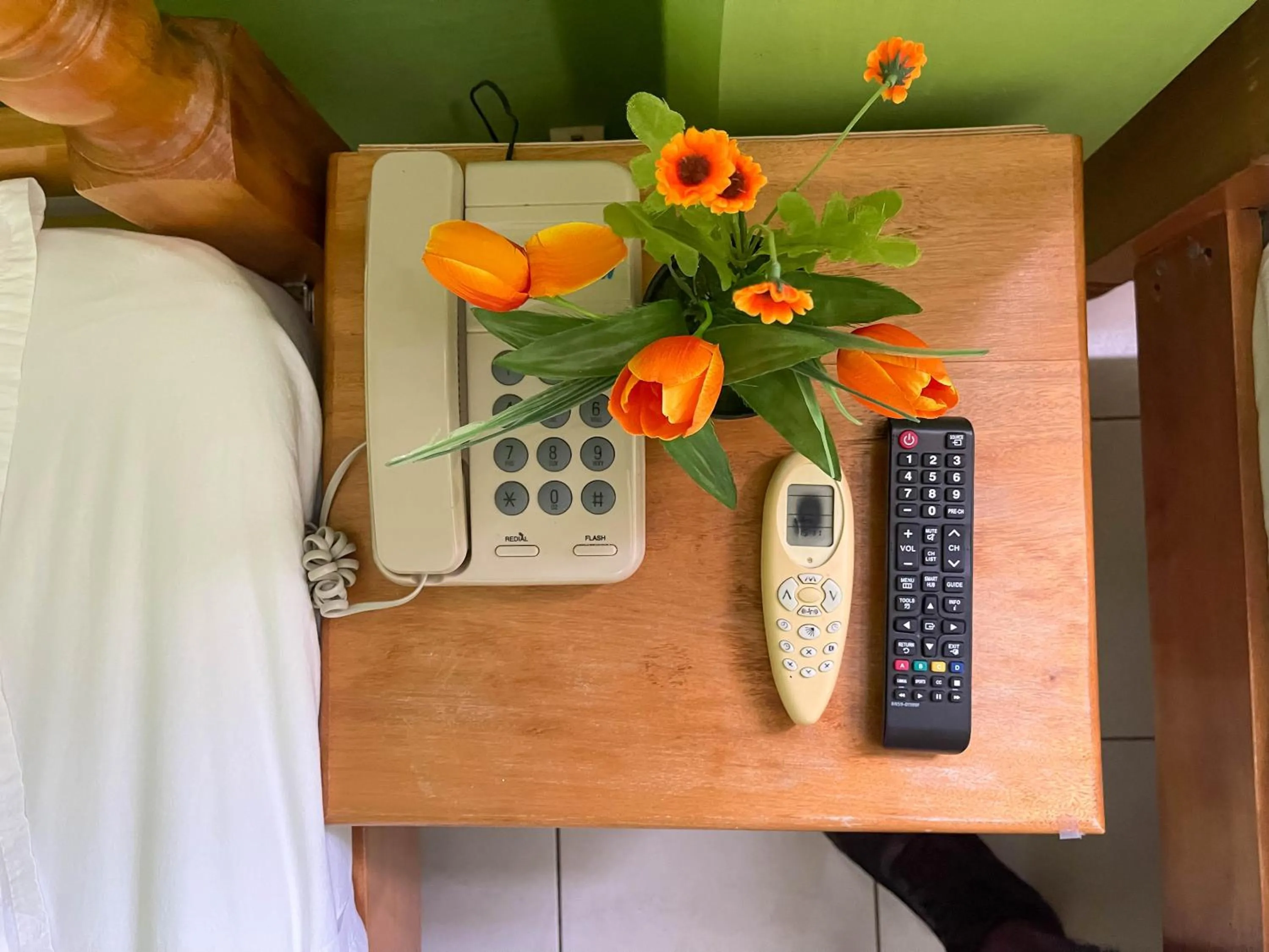 Bedroom in La Flamboyant Hotel
