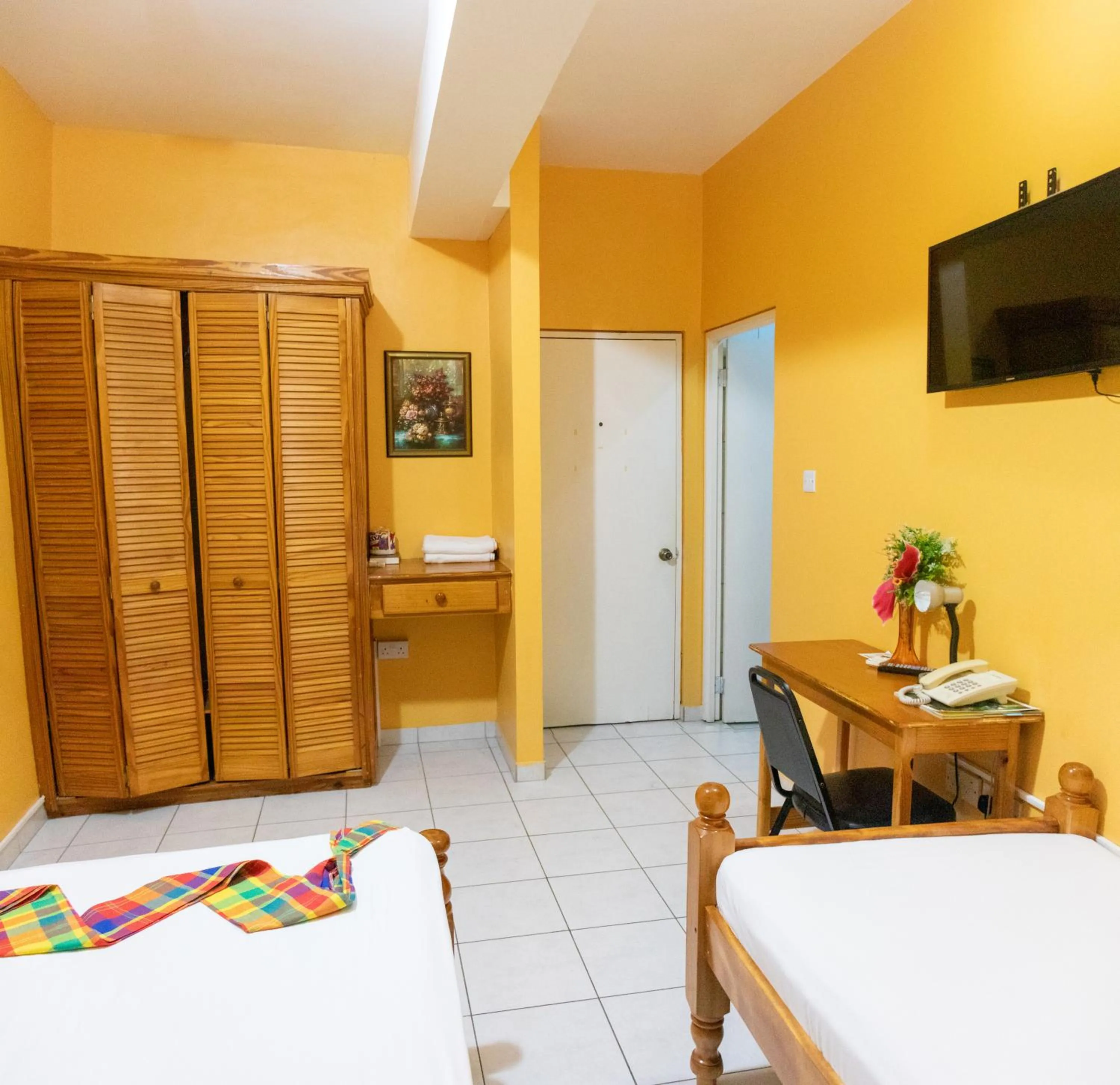 Photo of the whole room in La Flamboyant Hotel