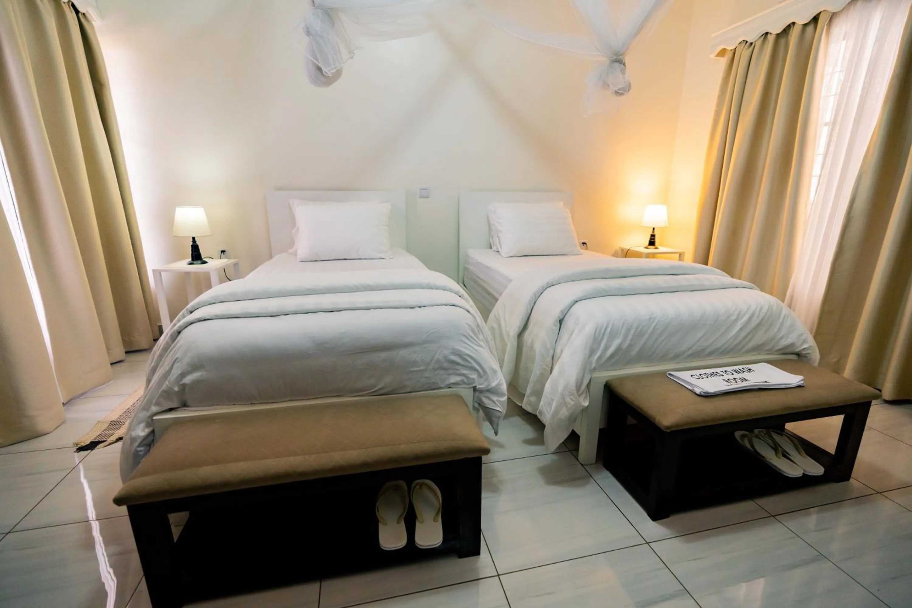 Bed in Blue Veil Villa Hotel