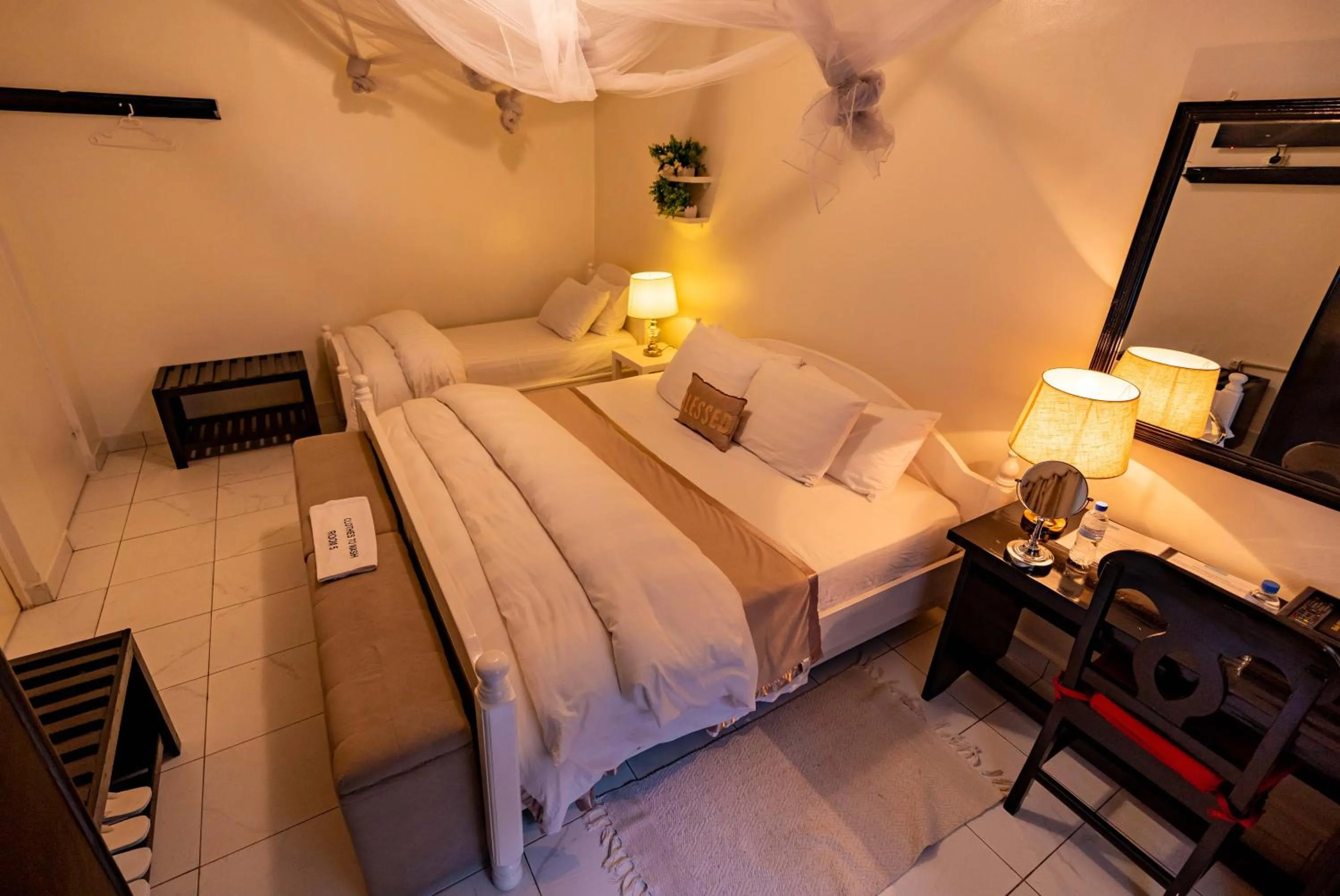 Bed in Blue Veil Villa Hotel