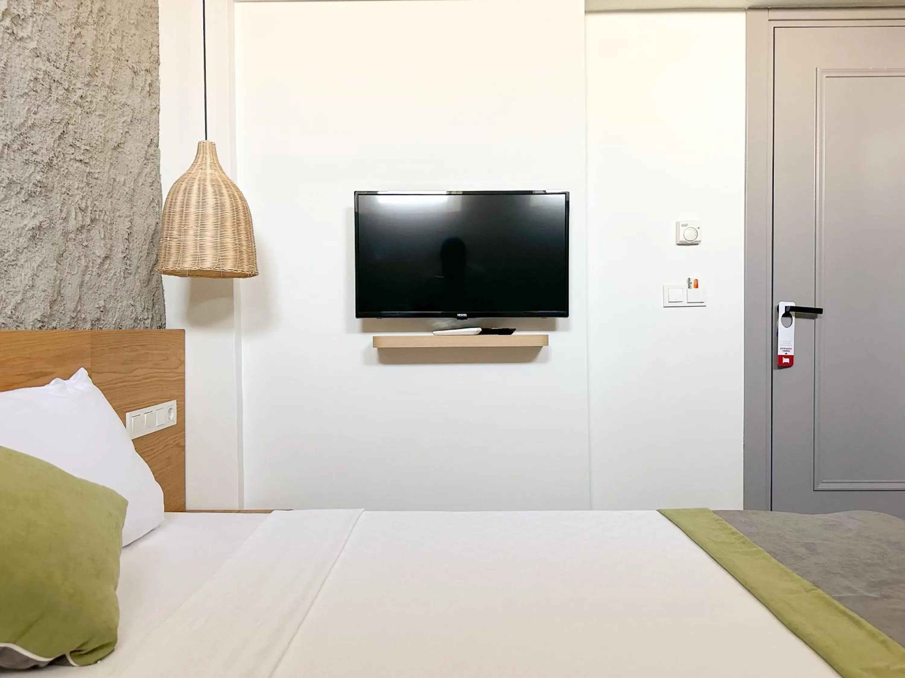 TV and multimedia, Bed in Müzeyyen Hanım Konağı Alaçatı TV and multimedia, Bed in Müzeyyen Hanım Konağı Alaçatı