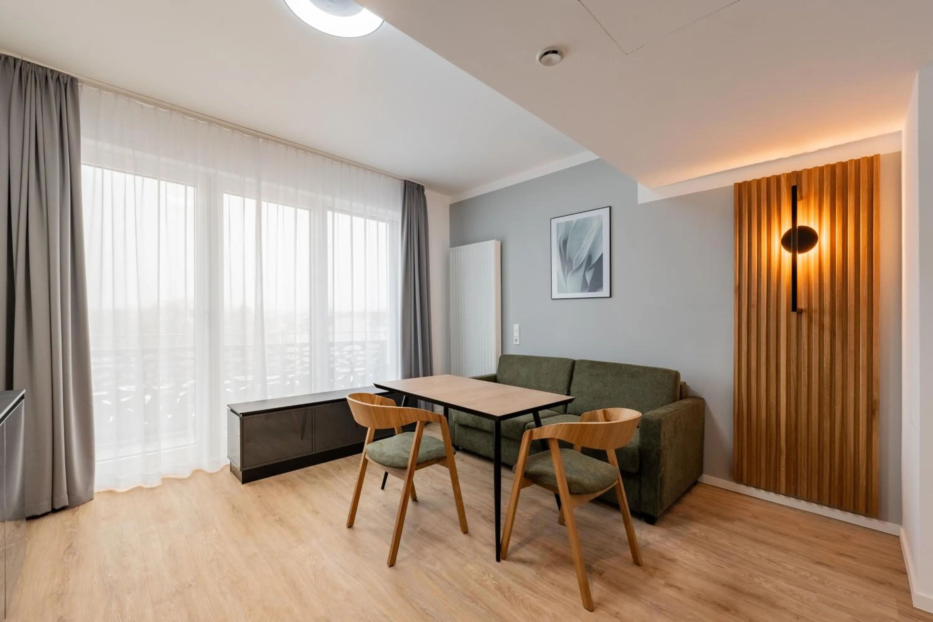 Seating area in Nena Apartments Berlin Adlershof