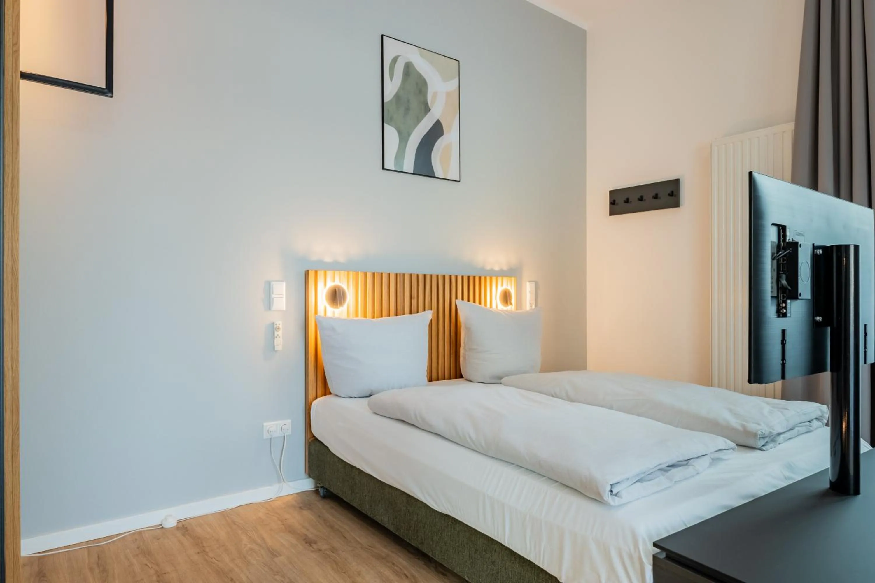 Bed in Nena Apartments Berlin Adlershof