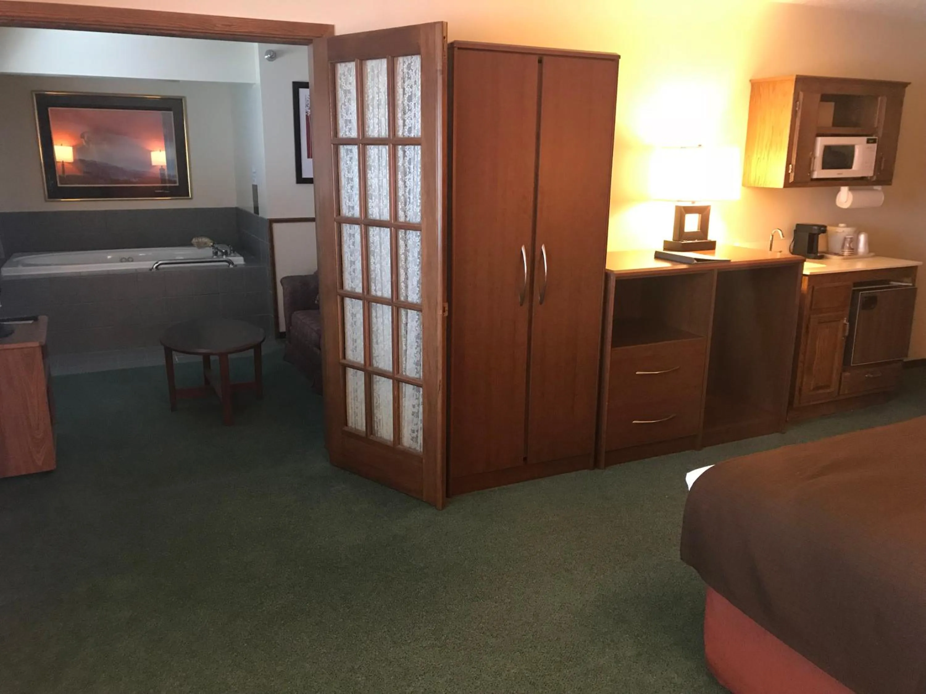 Photo of the whole room, Kitchen/Kitchenette in AmericInn by Wyndham Blackduck